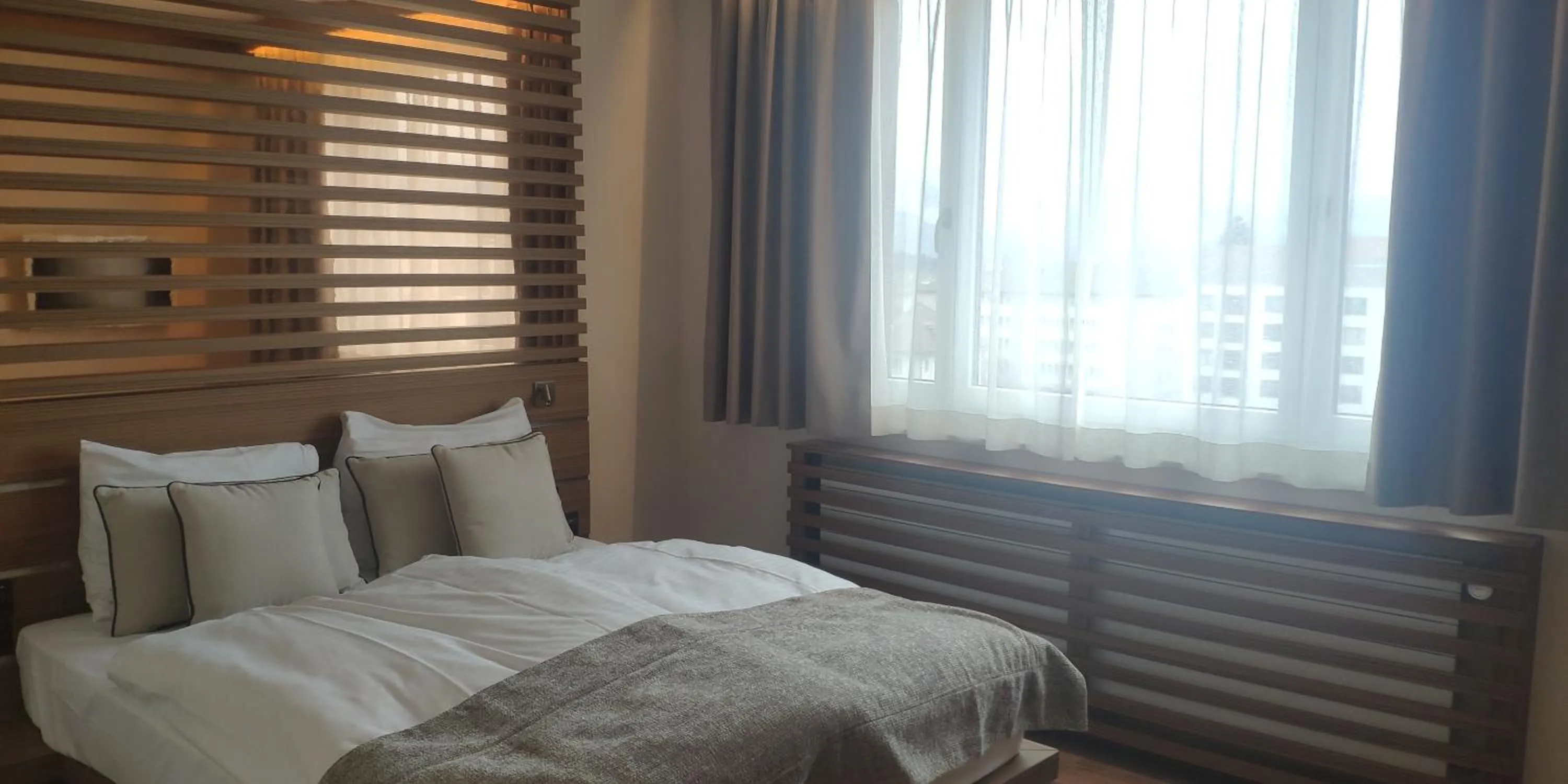 Bed in Hôtel Rallye & Entrées aux Bains de la Gruyère