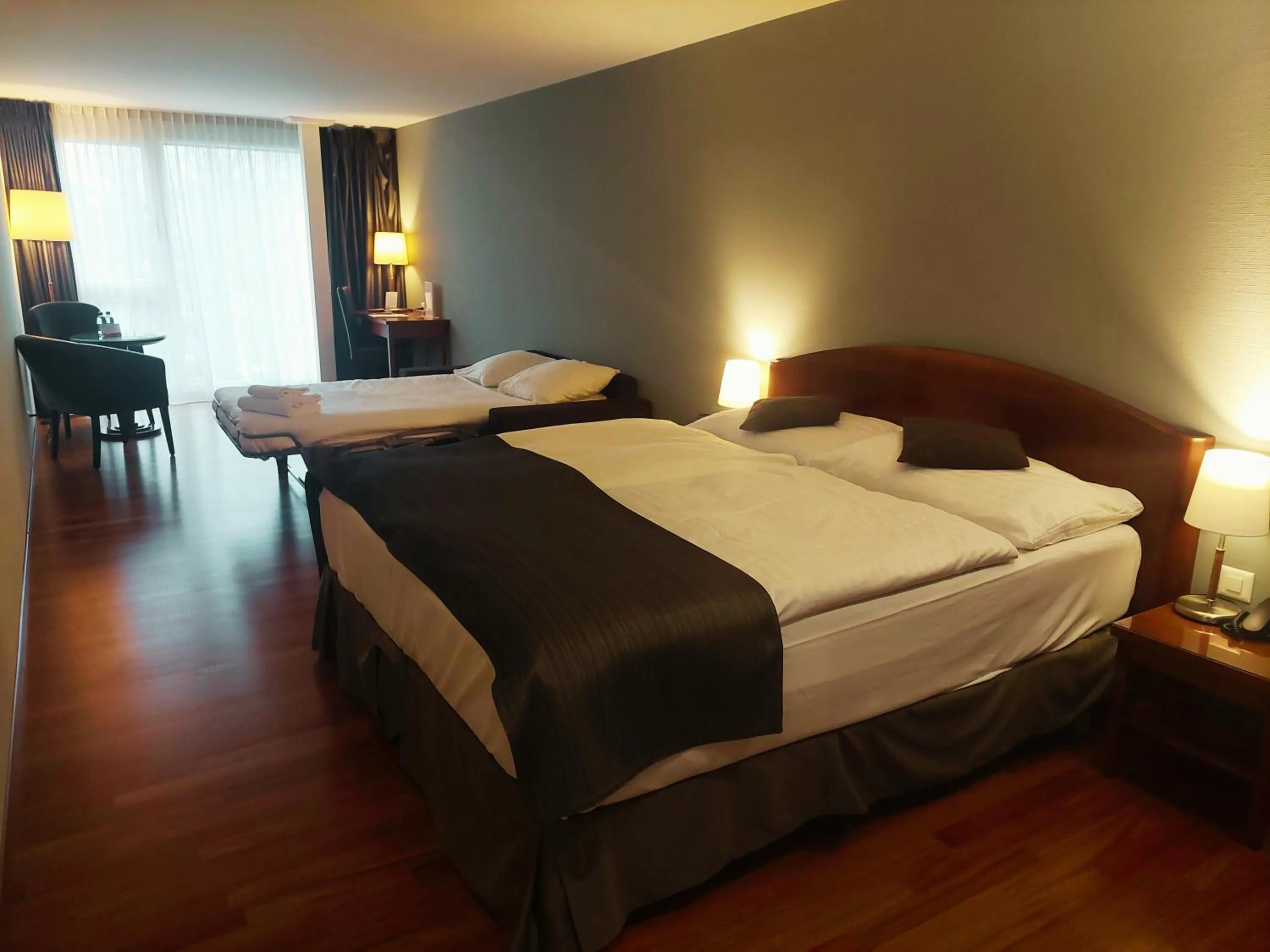 Bed in Hôtel Rallye & Entrées aux Bains de la Gruyère