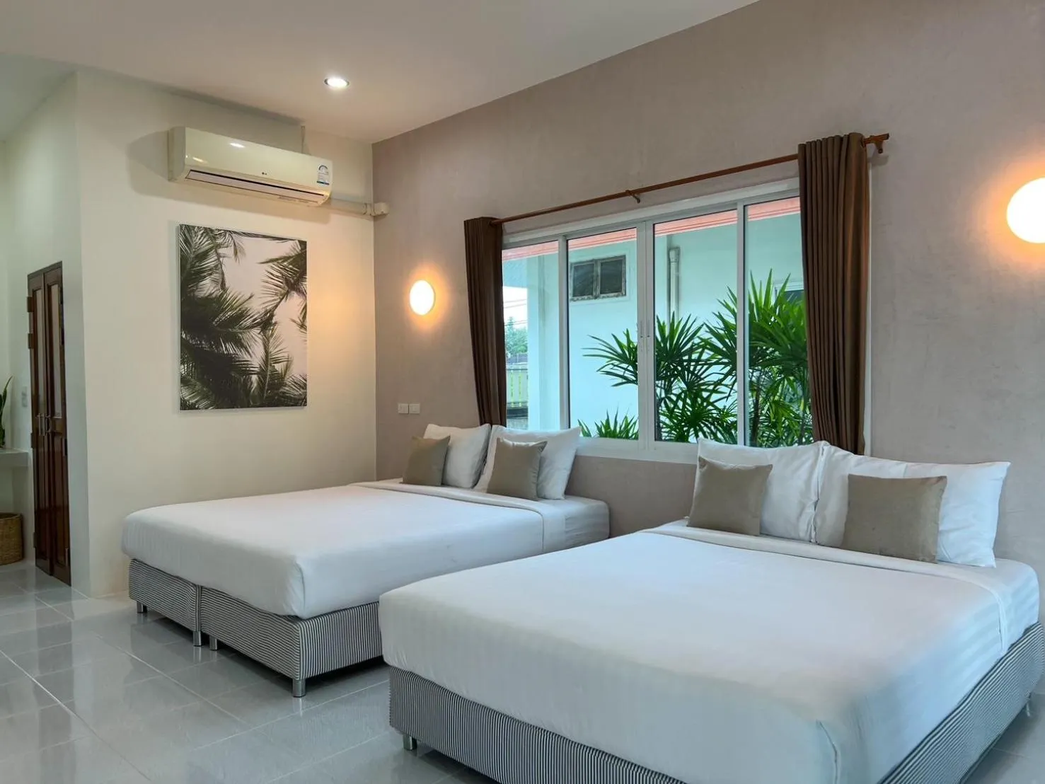 Bed in Nisasiri Boutique Resort