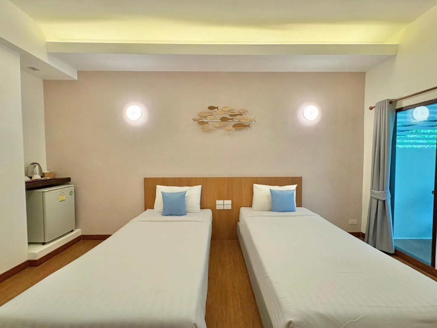 Bed in Nisasiri Boutique Resort