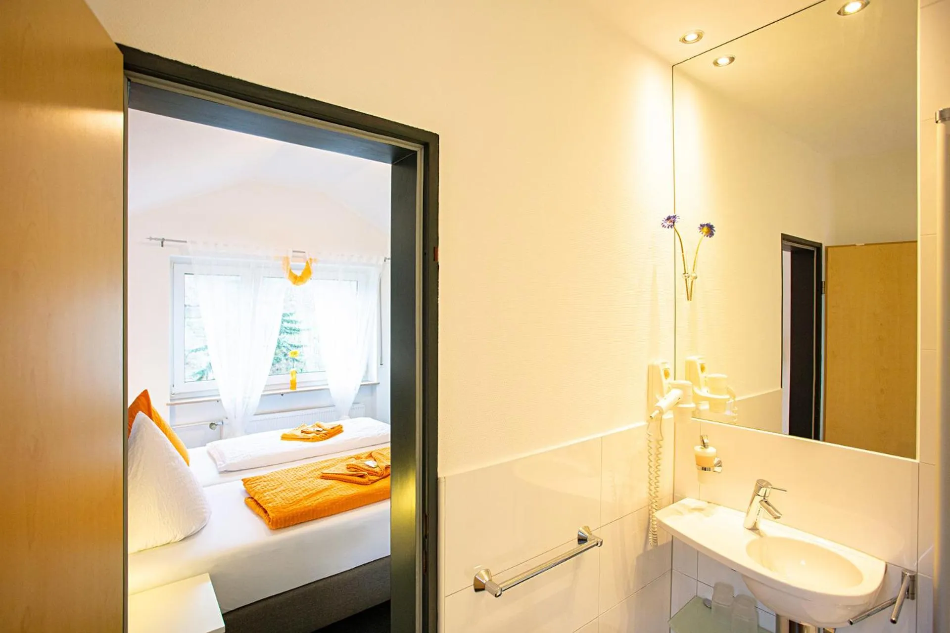 Bathroom, Bed in Hotel Emmerich