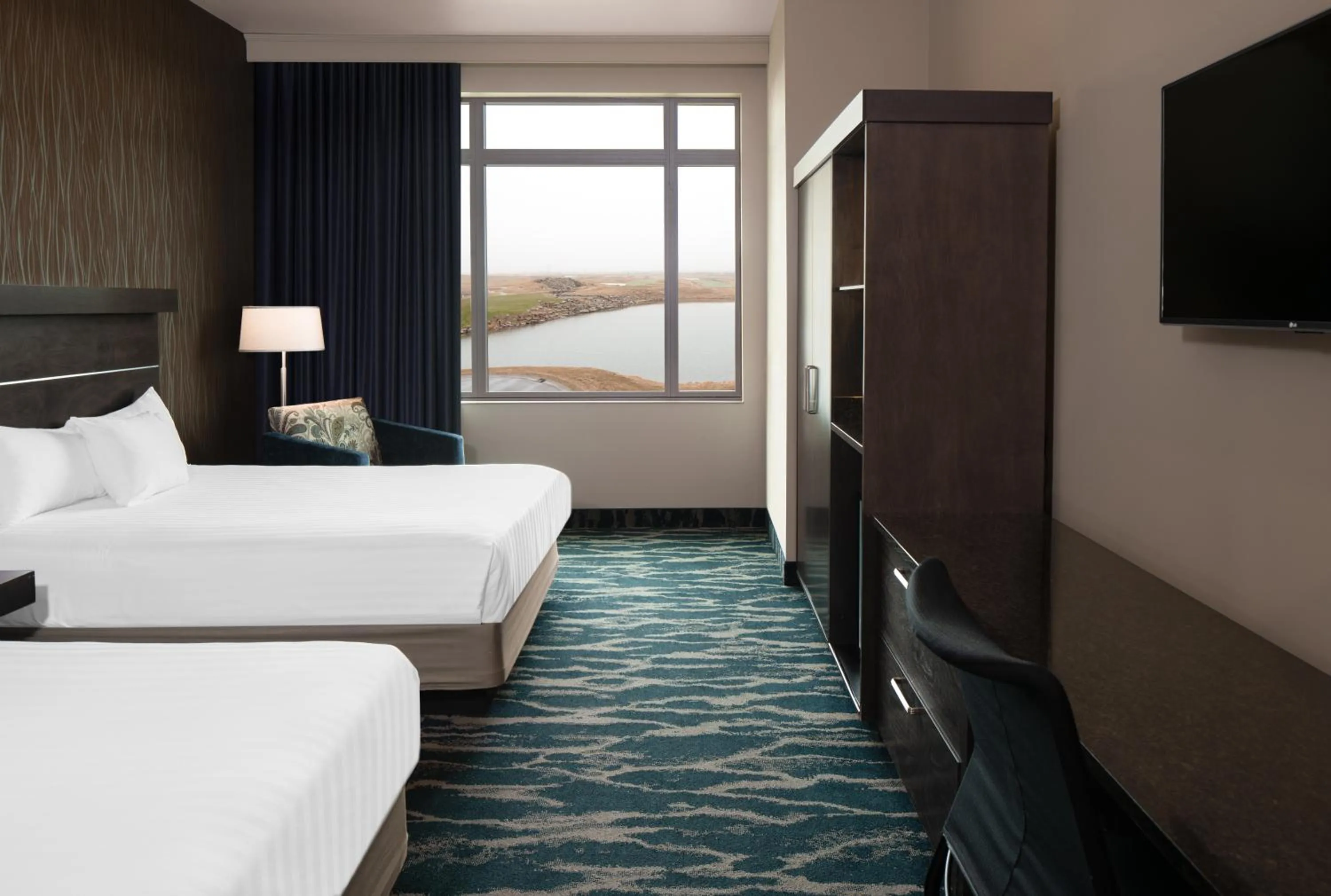 Photo of the whole room, Bed in Grand Falls Casino & Golf Resort