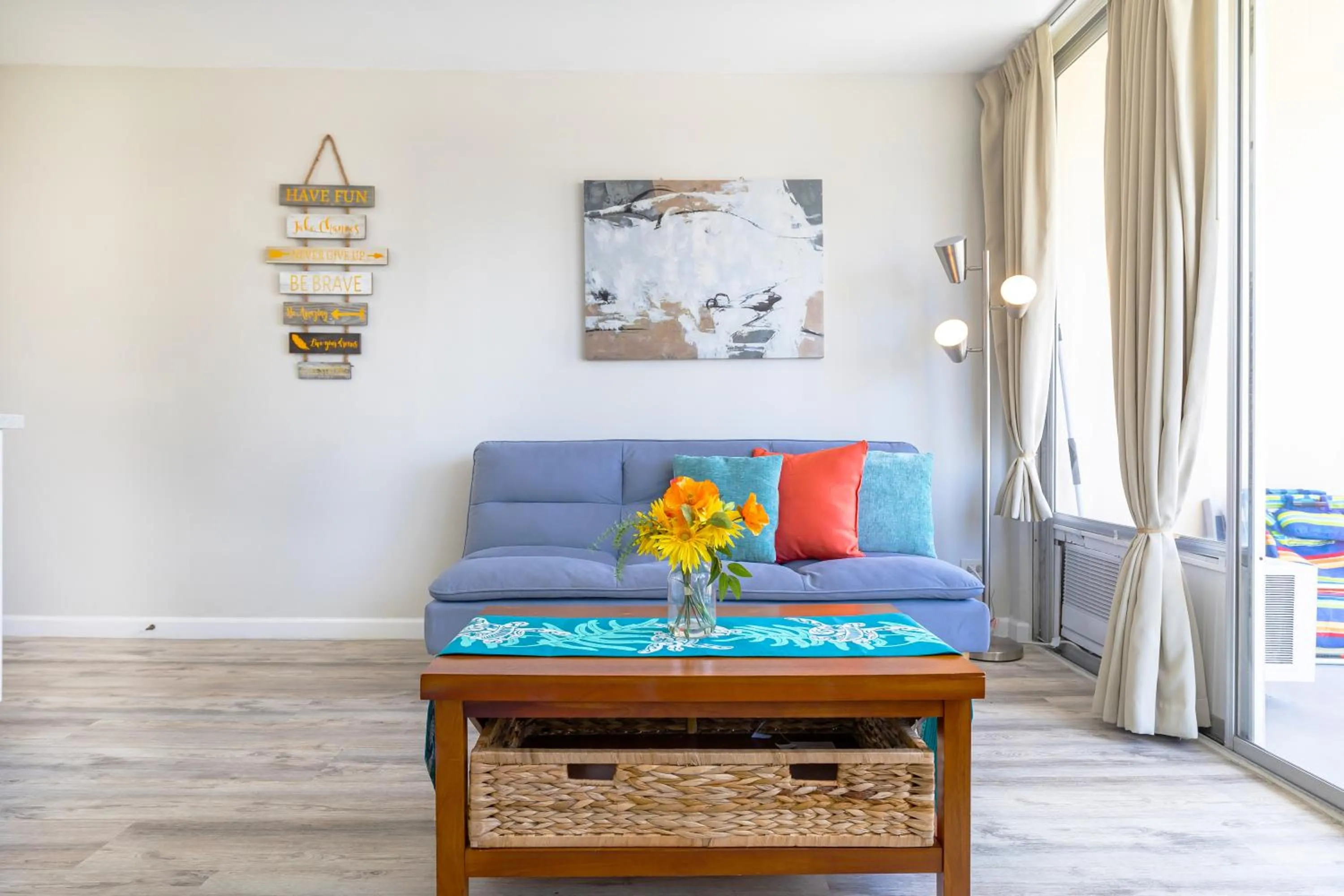 Living room in Cozy Waikiki Studio at Aqua Aloha Surf