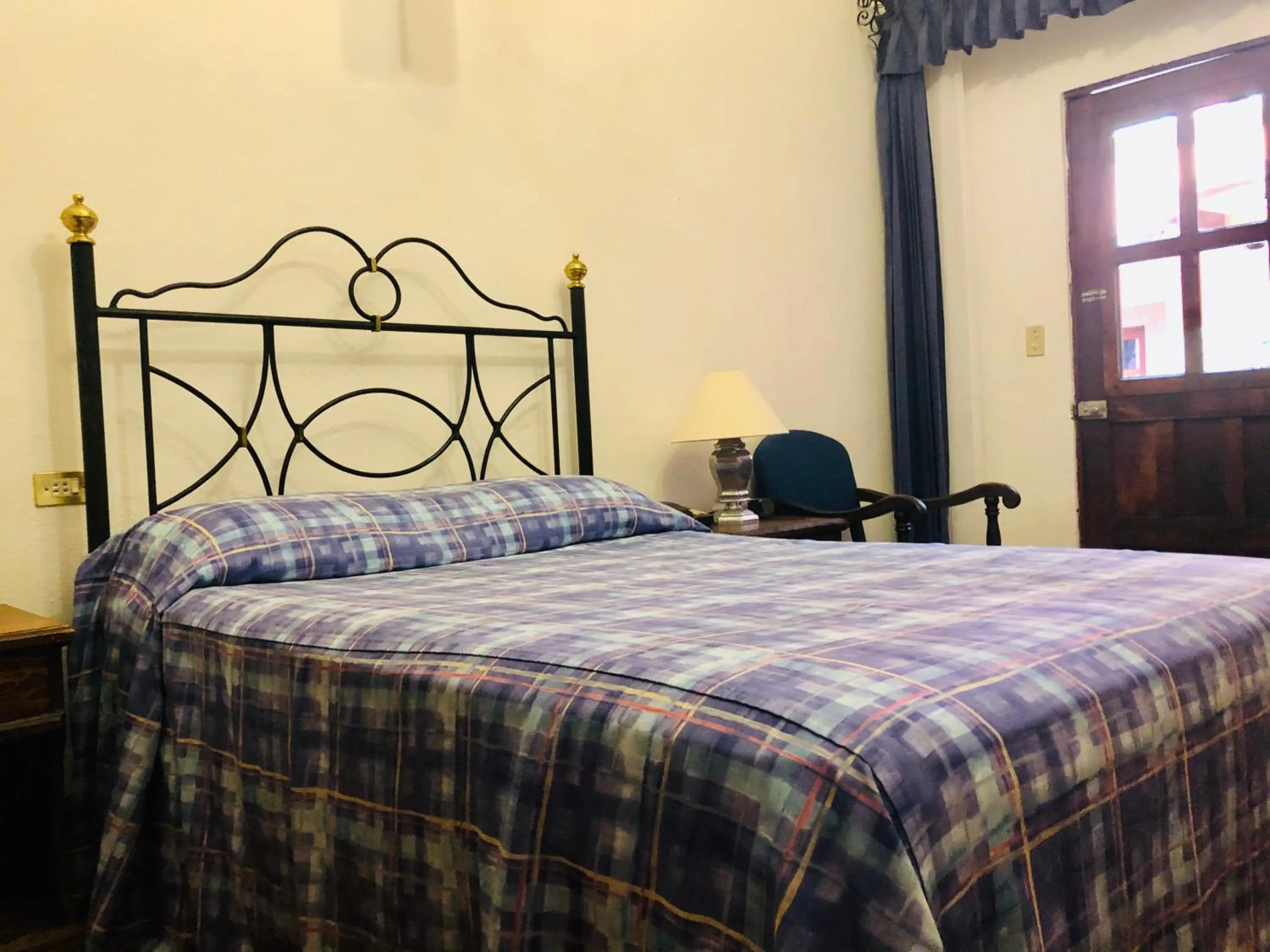 Bed in Hotel Mansión Virreyes by Rotamundos