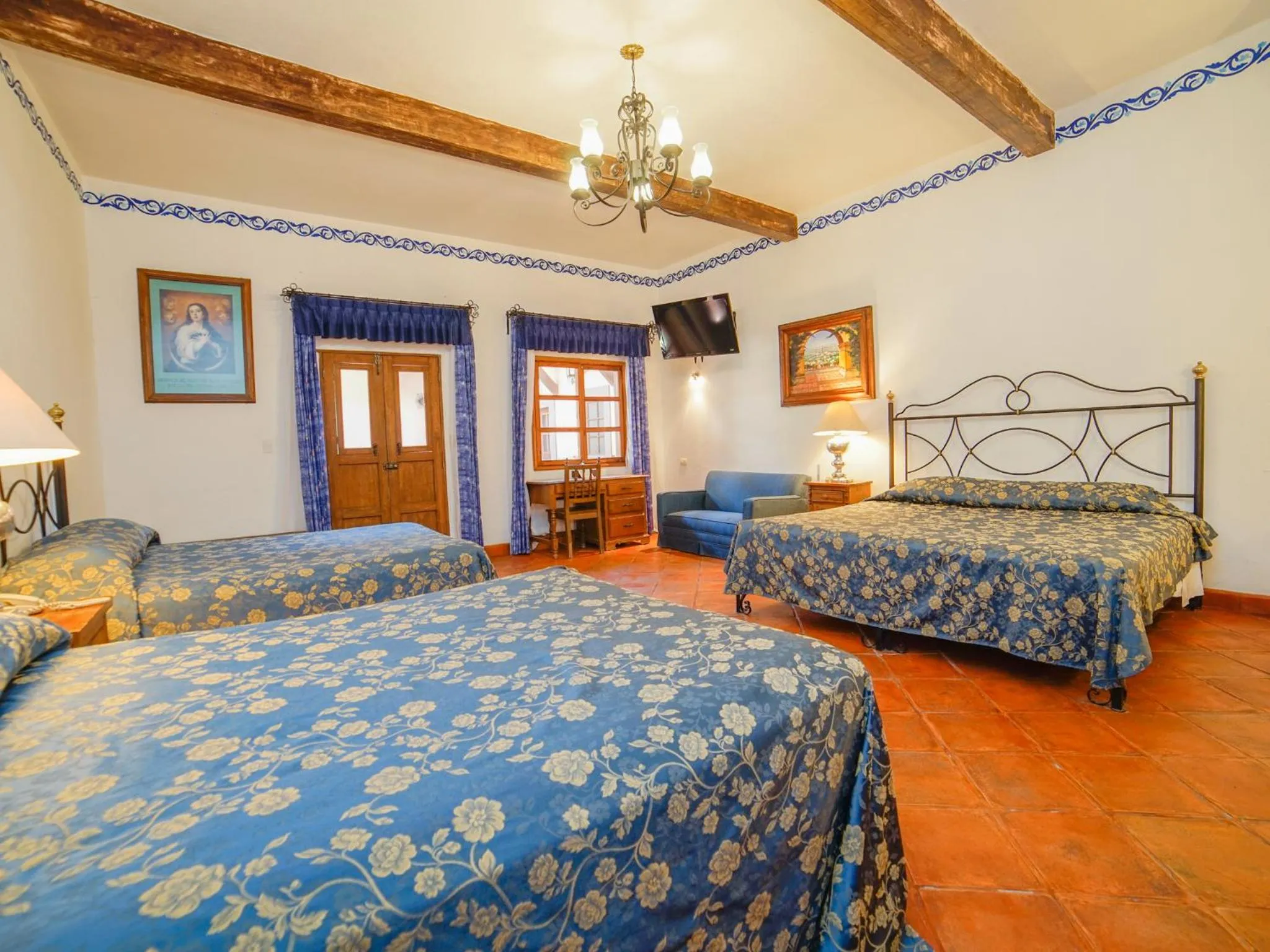 Bed in Hotel Mansión Virreyes by Rotamundos