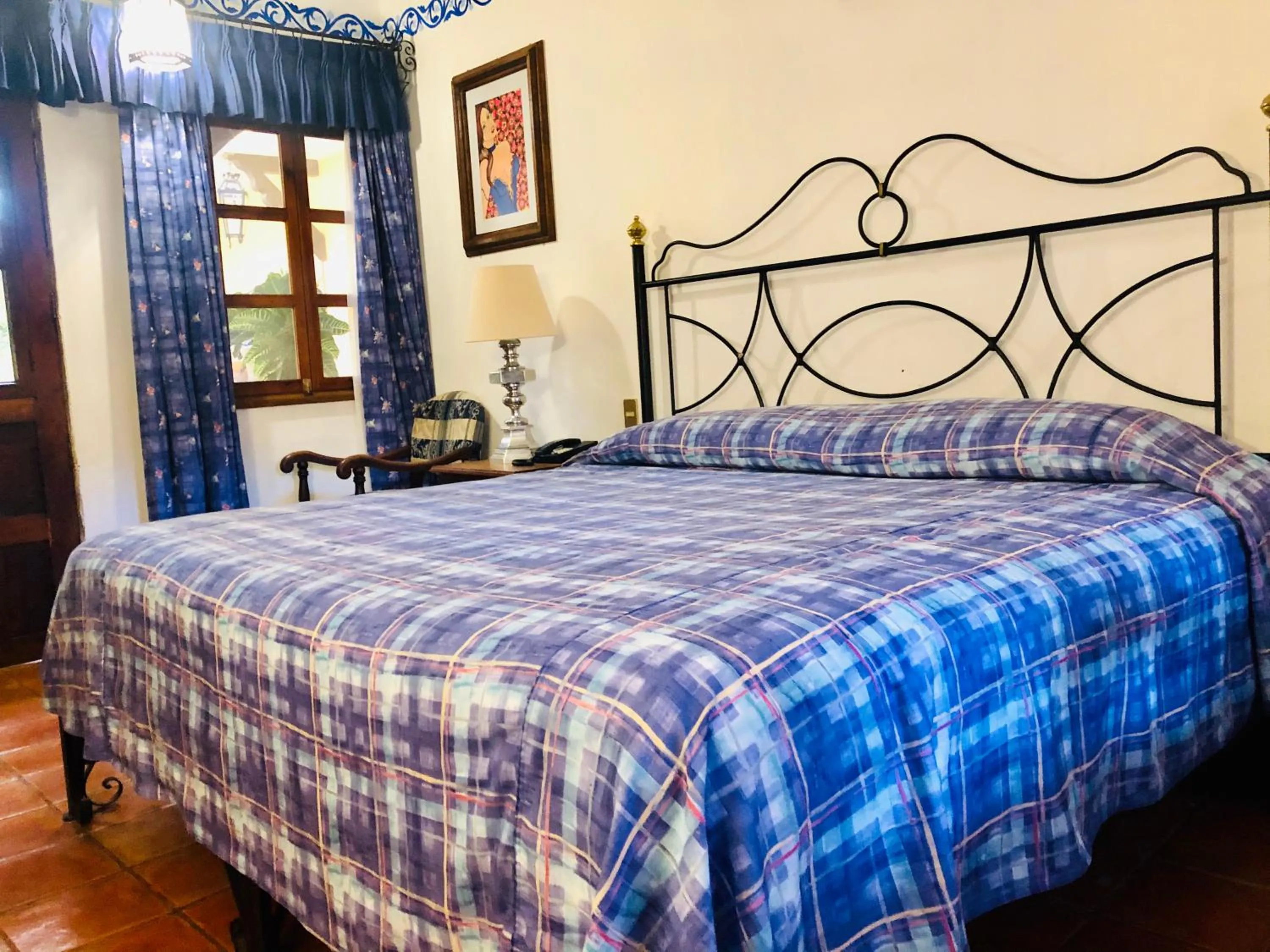 Bed in Hotel Mansión Virreyes by Rotamundos