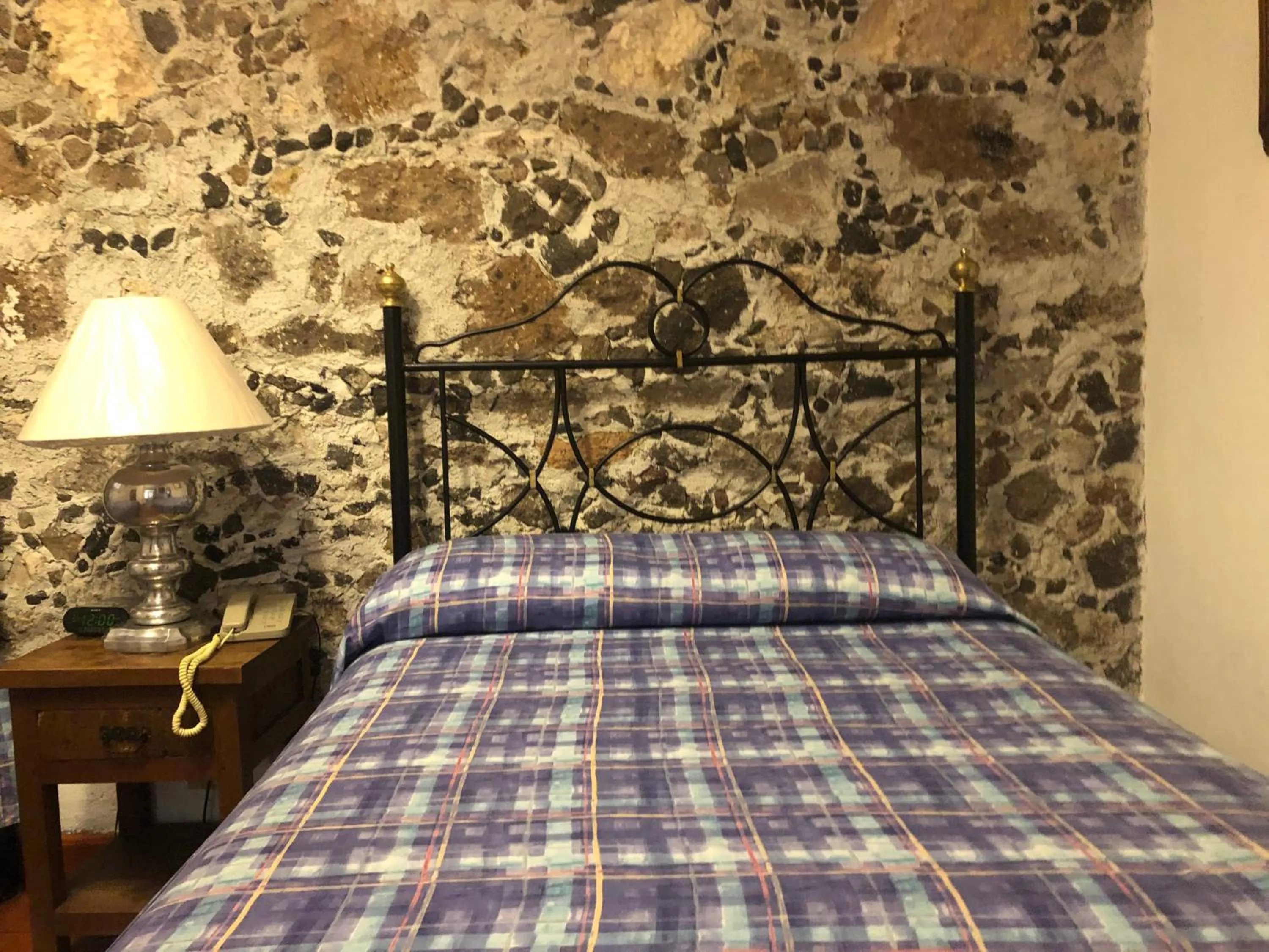 Bed in Hotel Mansión Virreyes by Rotamundos