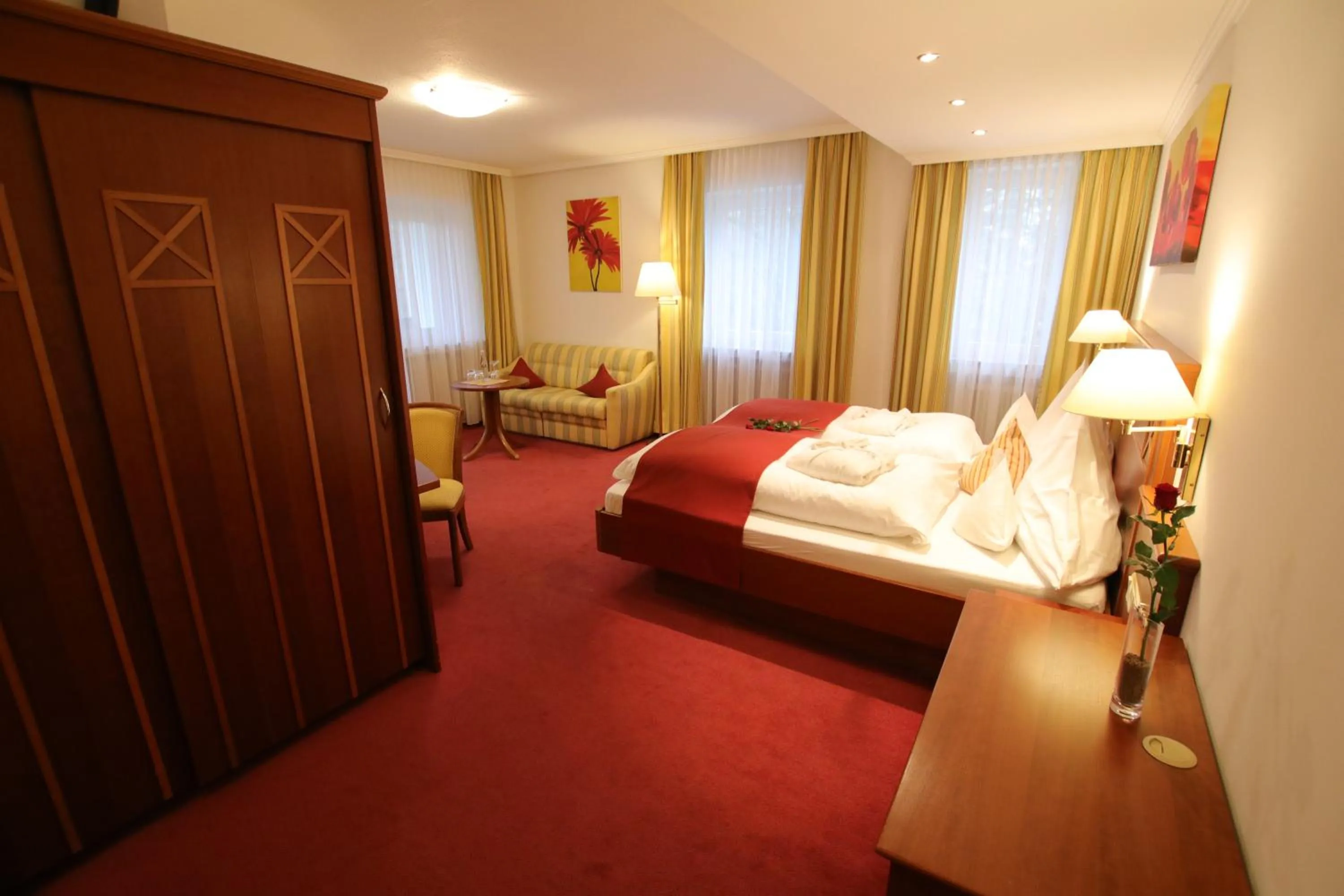 Photo of the whole room, Bed in ANGERHOF Kur- und Thermenhotel