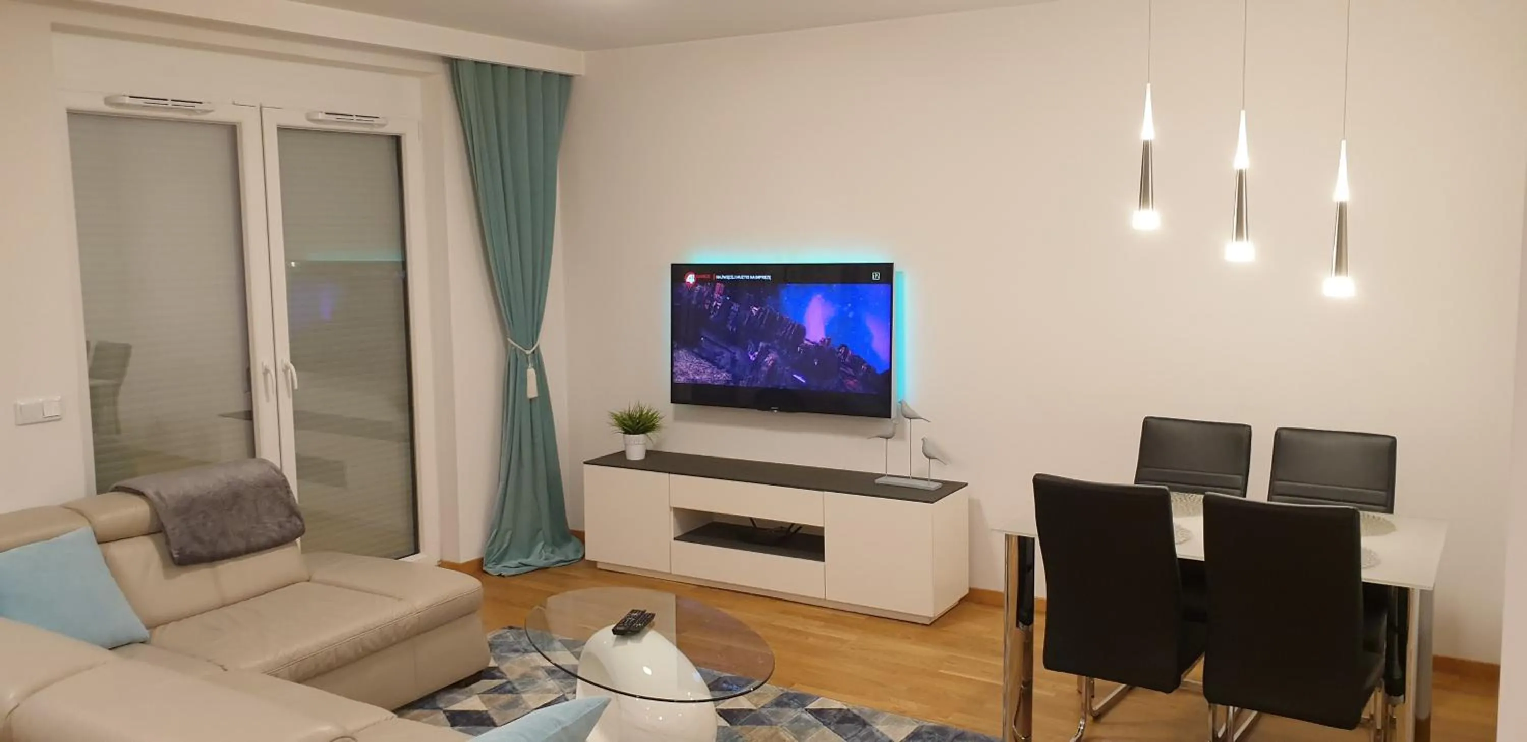 Communal lounge/ TV room in River Deluxe Atal Towers Apartment