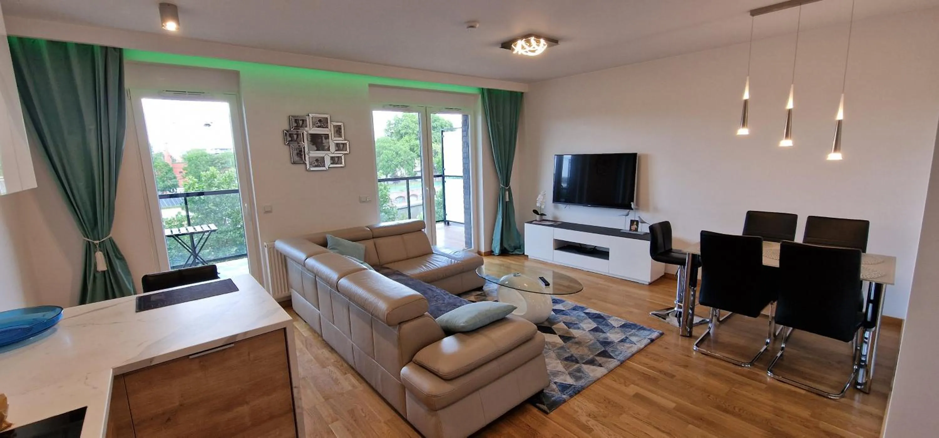 Communal lounge/ TV room in River Deluxe Atal Towers Apartment