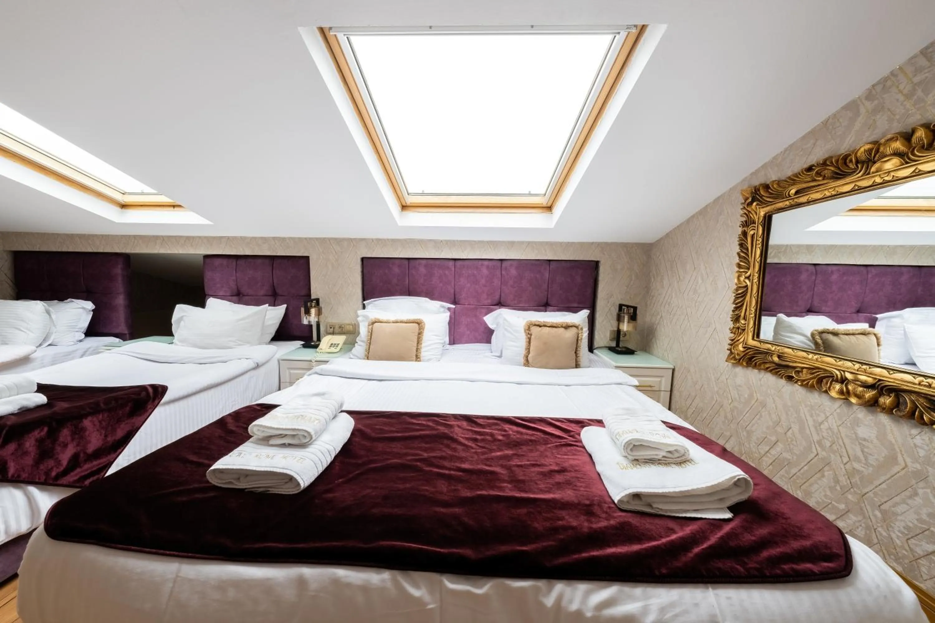 Bed in Diamond Royal Hotel