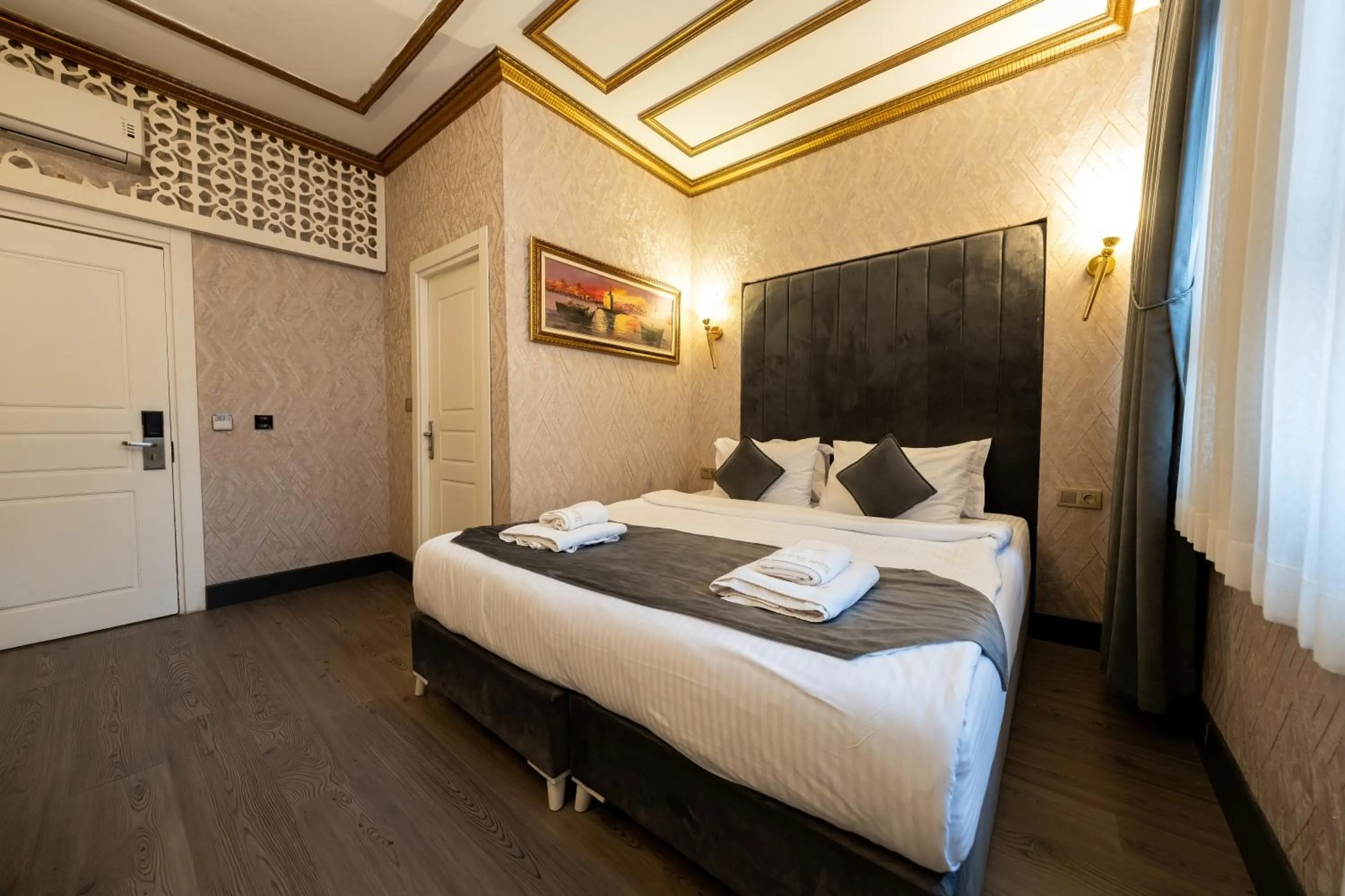 Bed in Diamond Royal Hotel