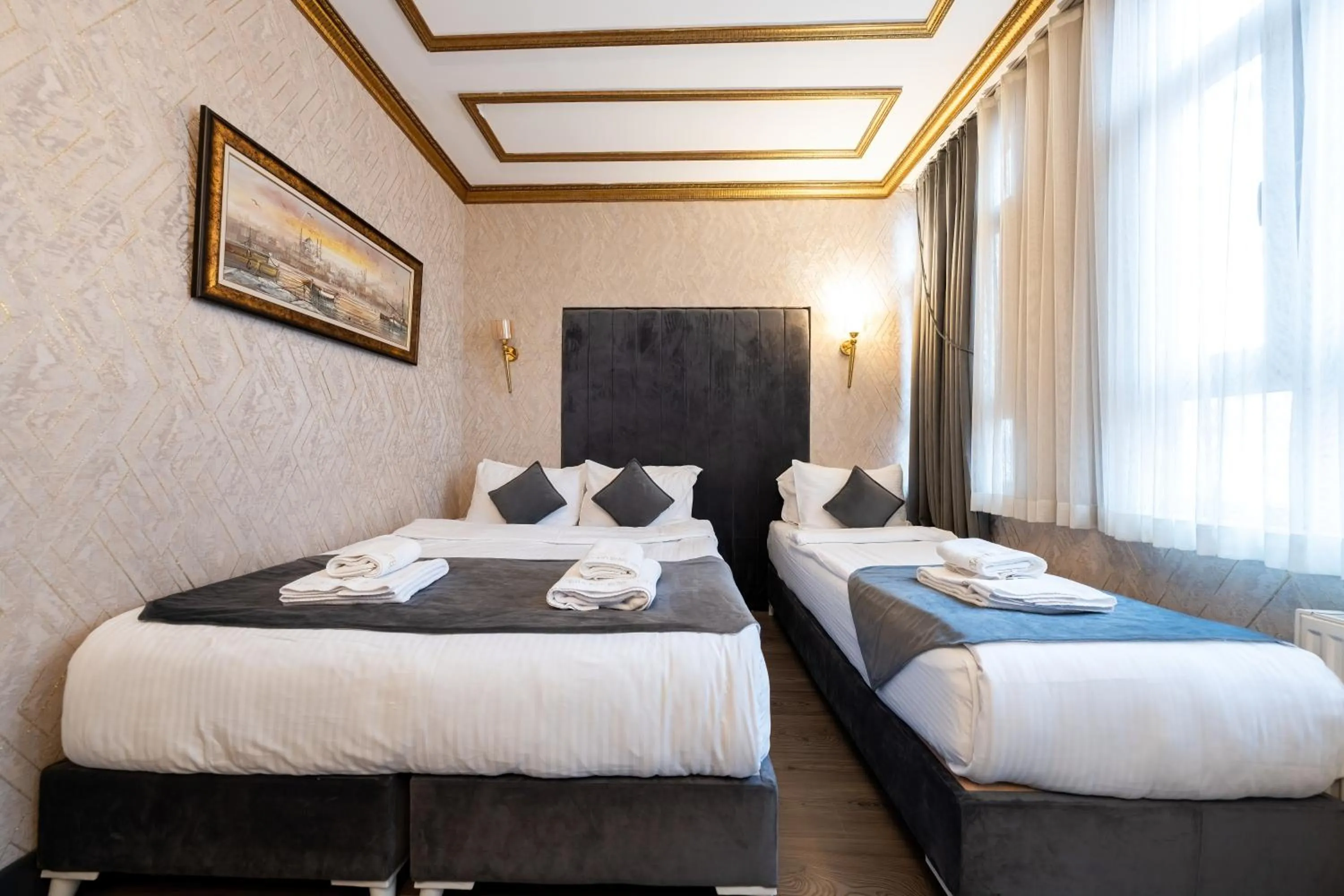 Bed in Diamond Royal Hotel