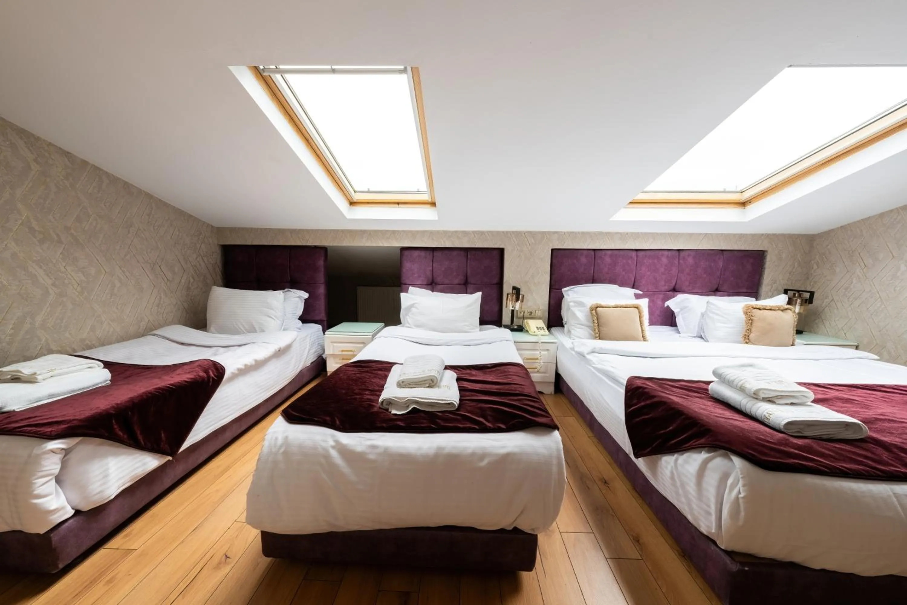 Bed in Diamond Royal Hotel