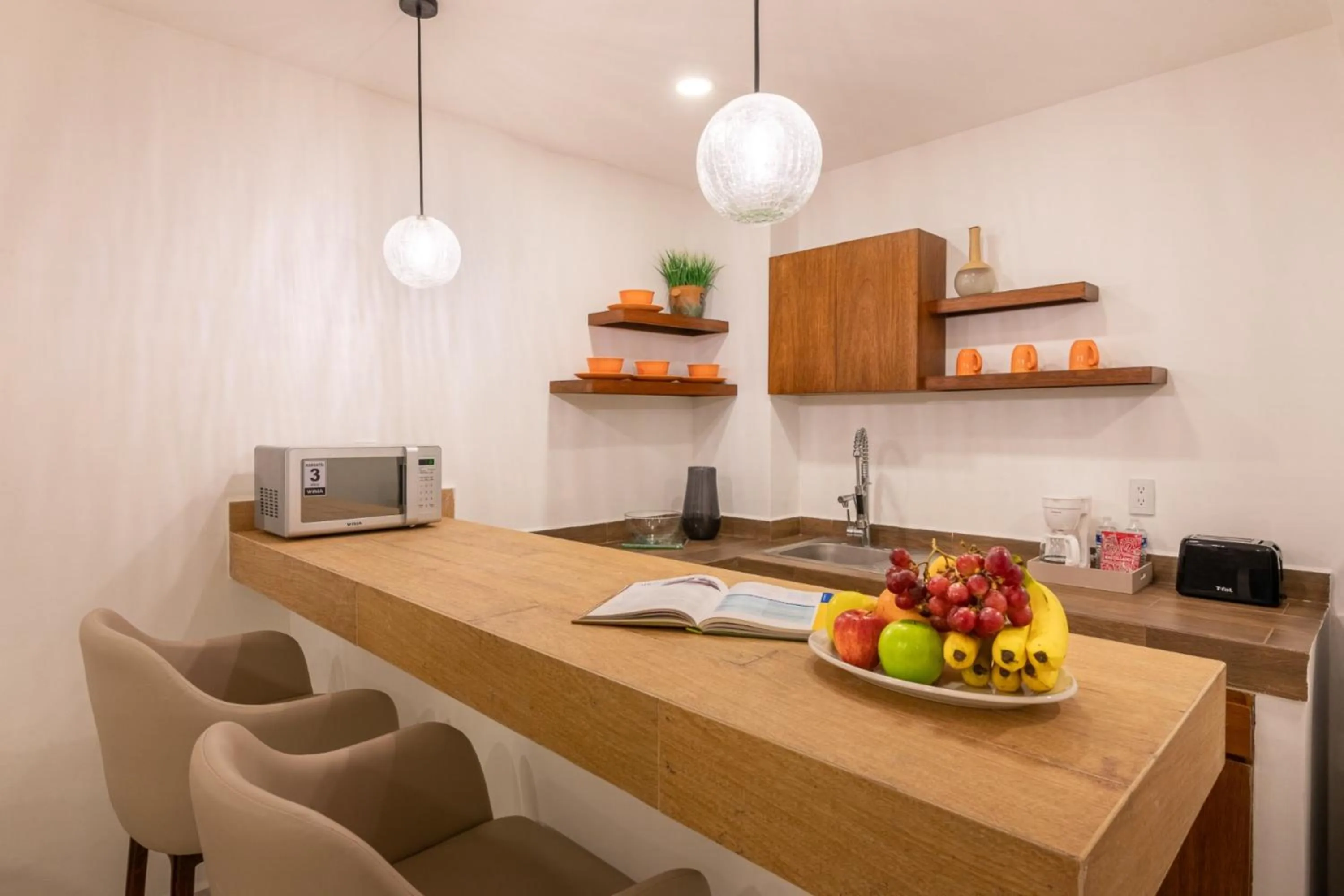 Kitchen or kitchenette in Marvic Hotel Boutique