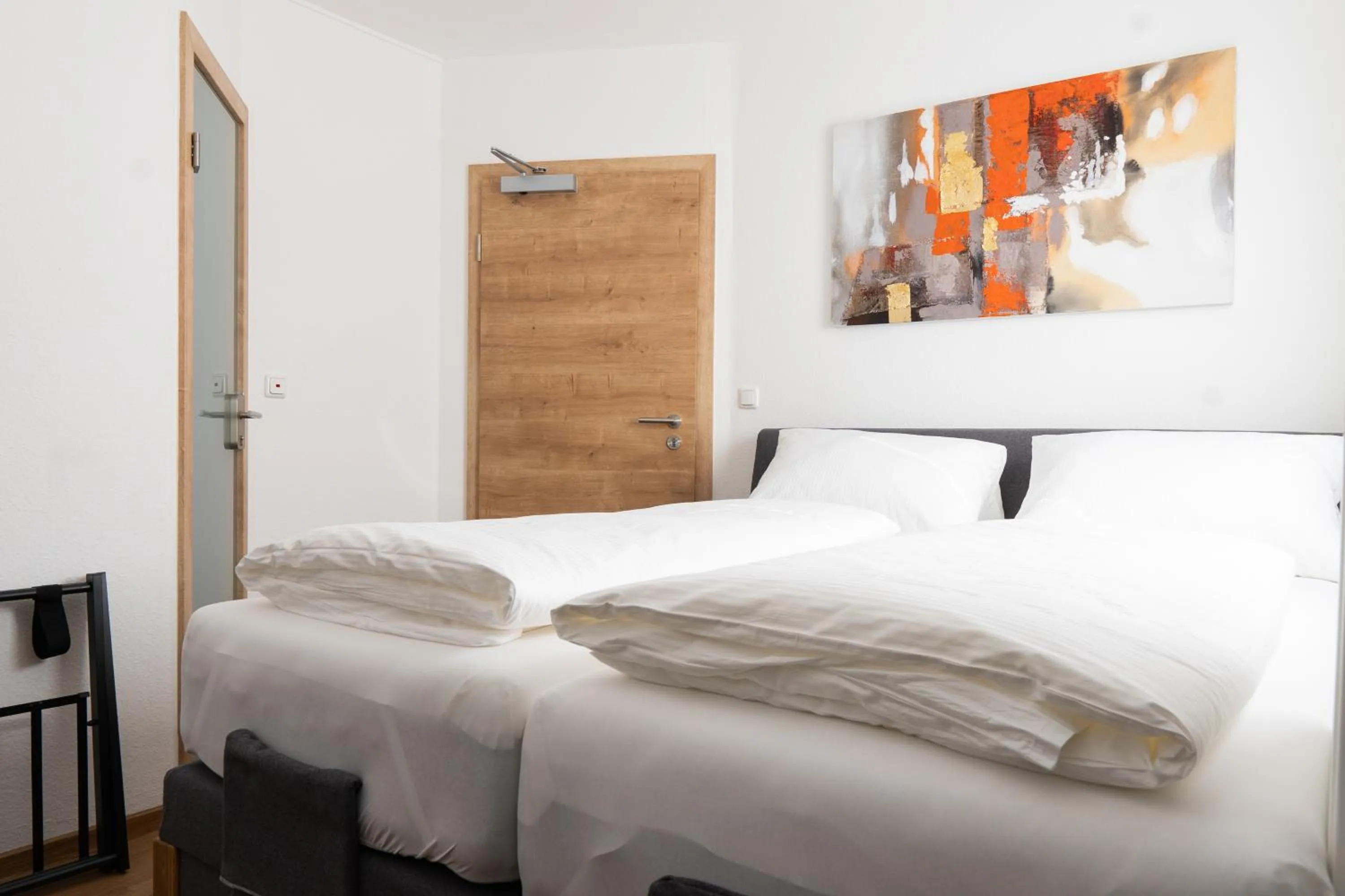 Photo of the whole room, Bed in Hotel Dortmunder Hof