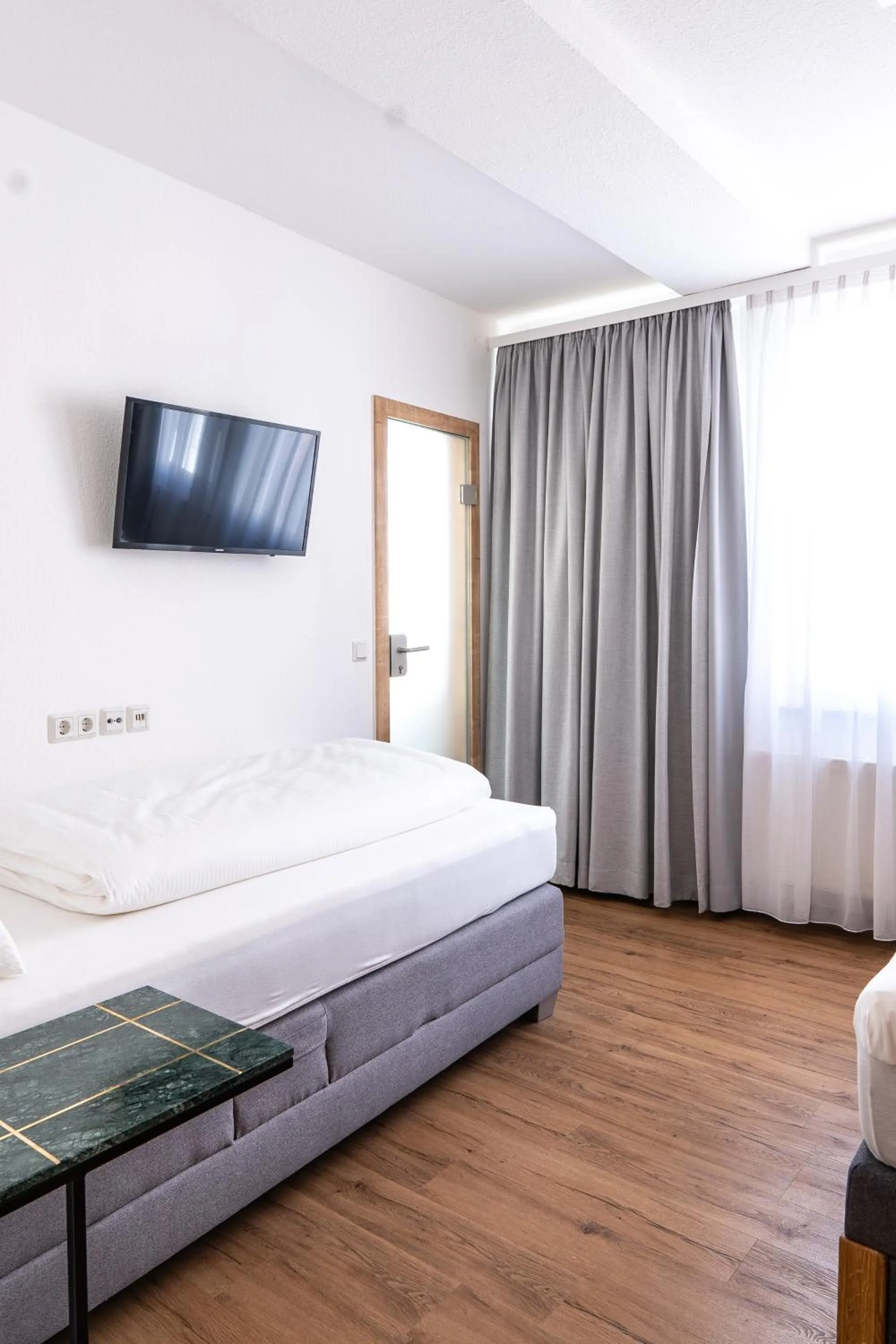 Photo of the whole room, Bed in Hotel Dortmunder Hof