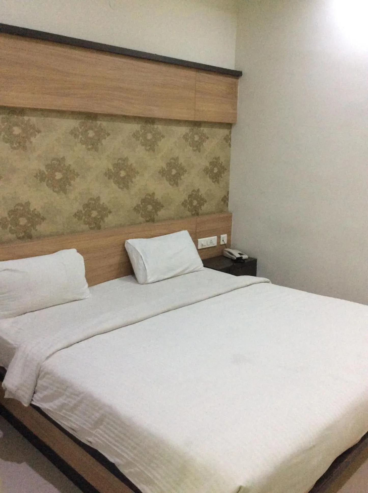 Bed in HOTEL SRI VAARI RESIDENCY