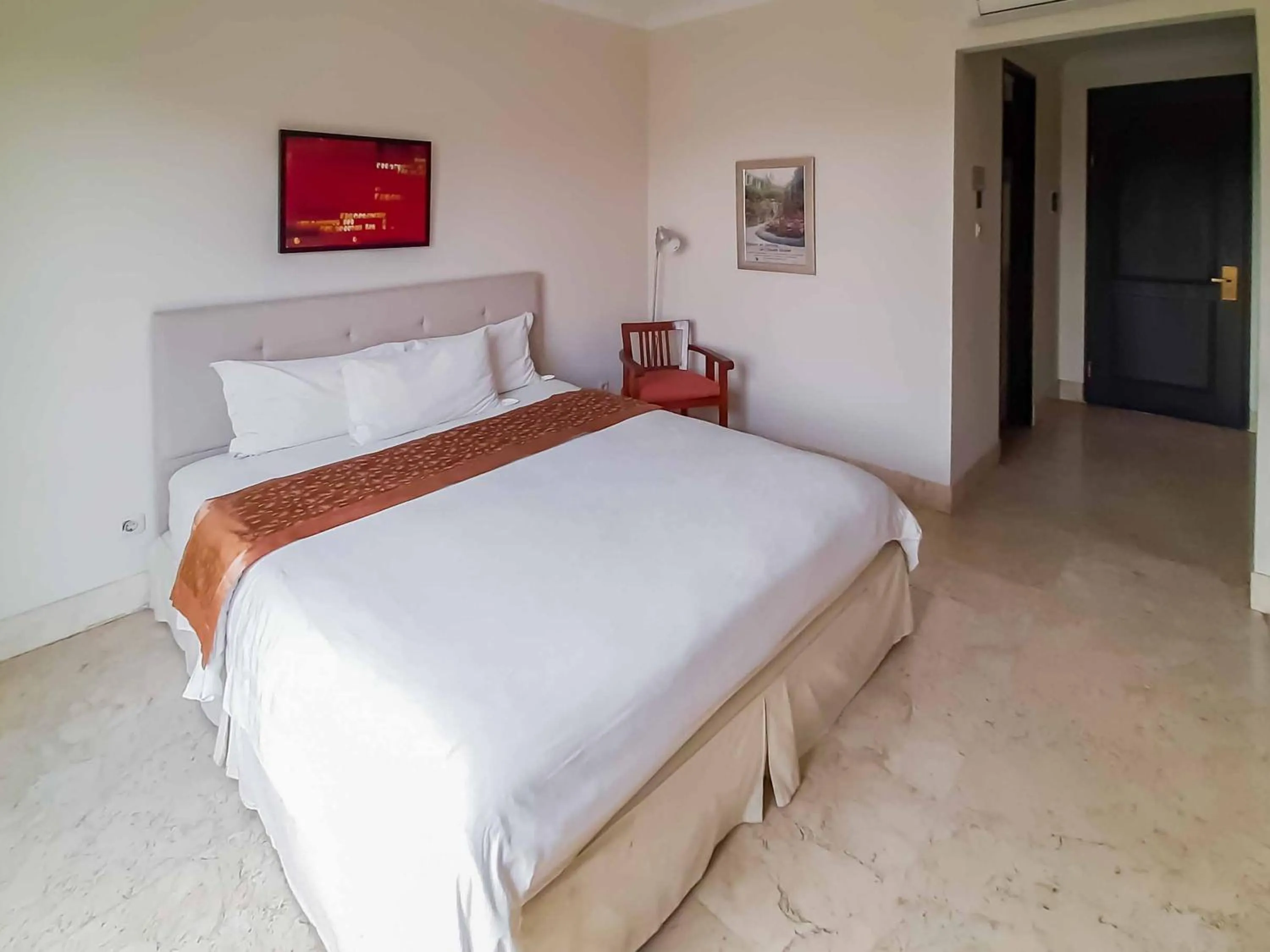 Bed in Bangka Suite Mitra RedDoorz