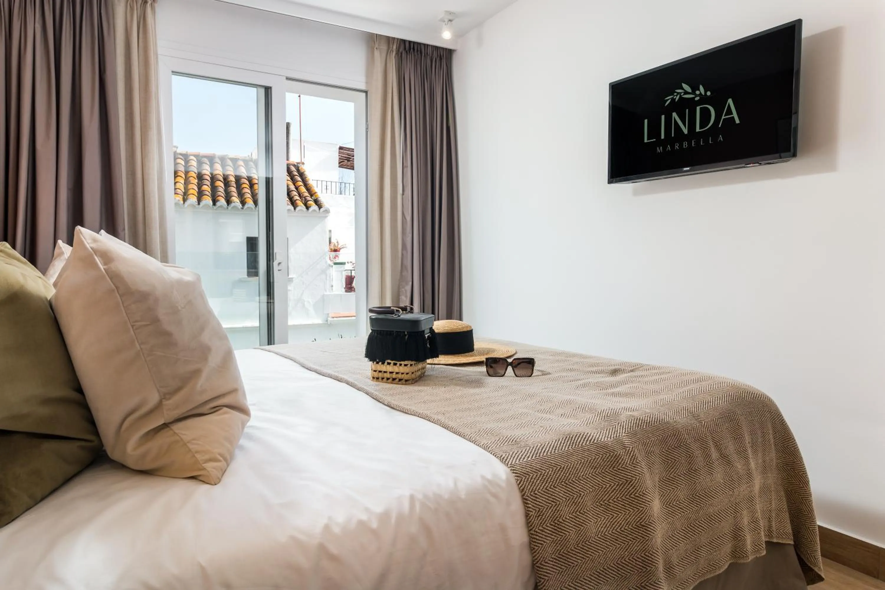 Bed in Linda Boutique Hotel