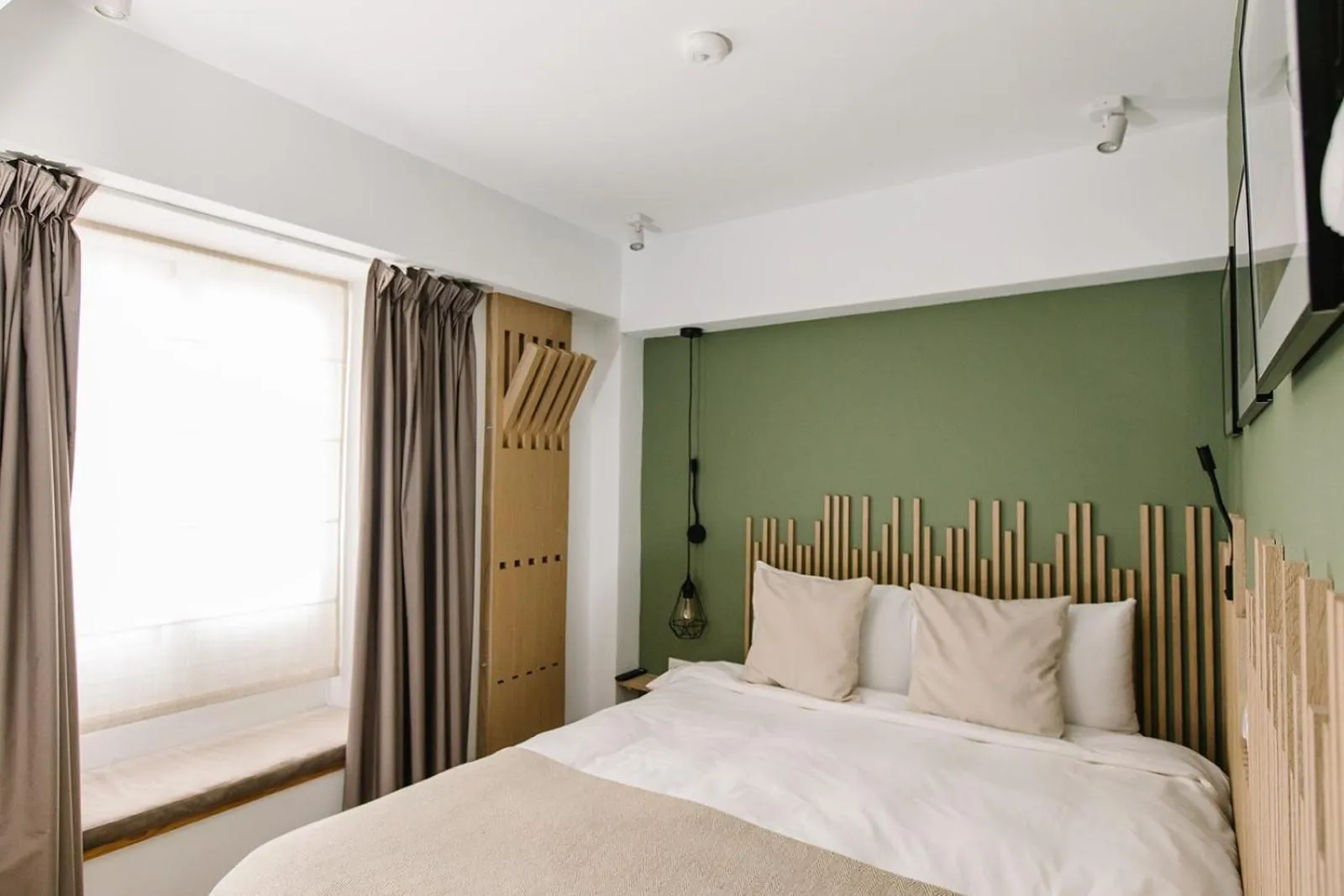 Bed in Linda Boutique Hotel