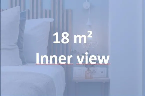 Bed in Linda Boutique Hotel