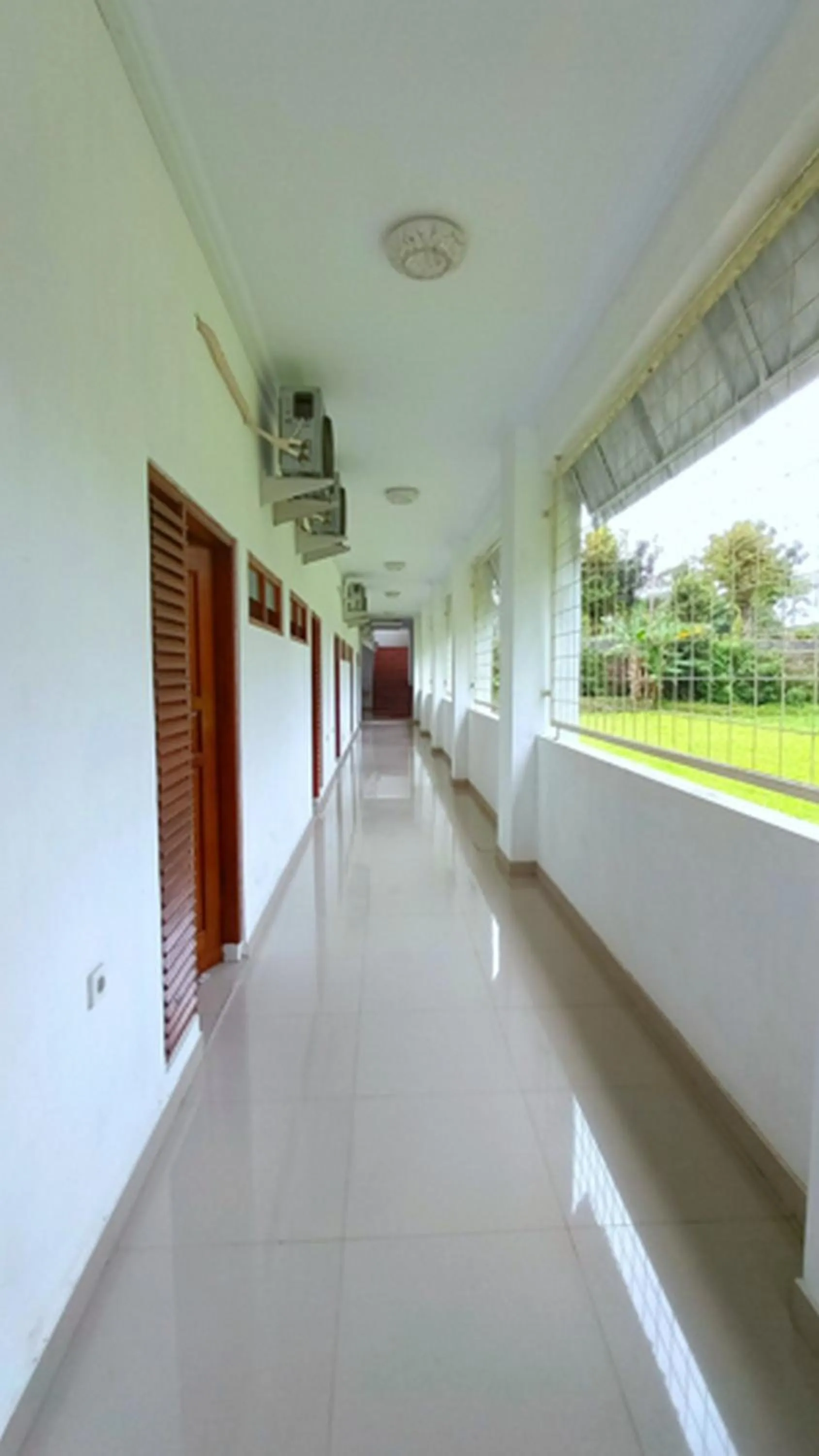 Property building in RedDoorz At Artomoro Guest House