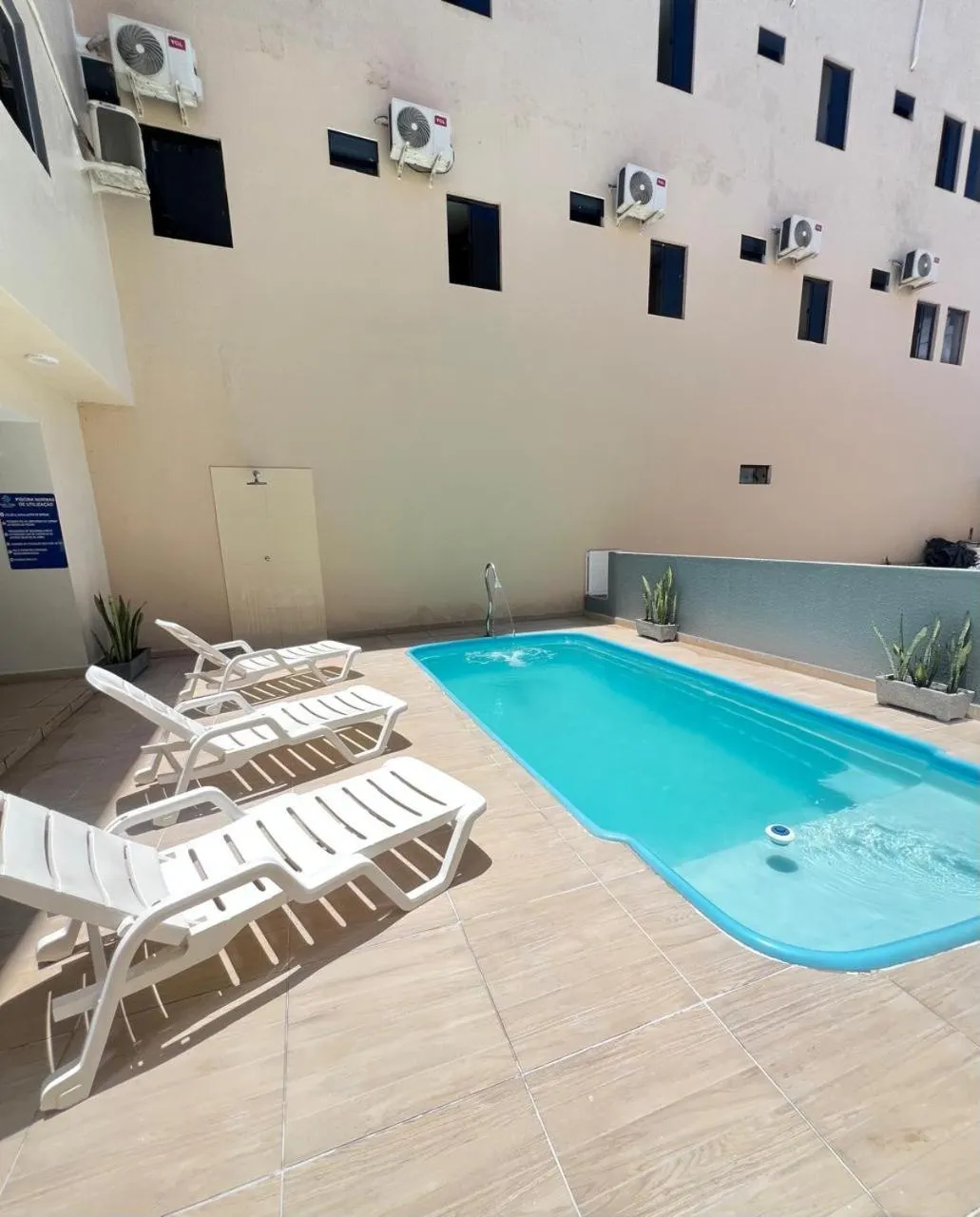 Swimming pool in Pousada Praia Bela