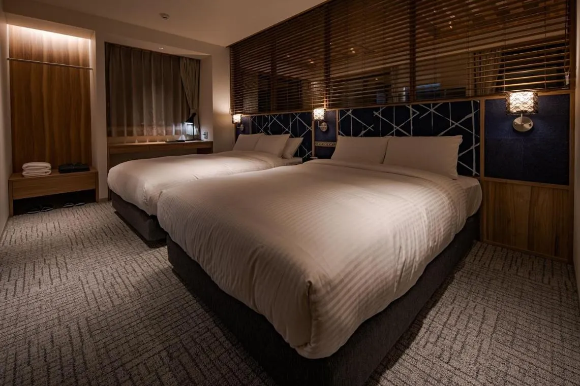 Photo of the whole room, Bed in UNO HOTEL