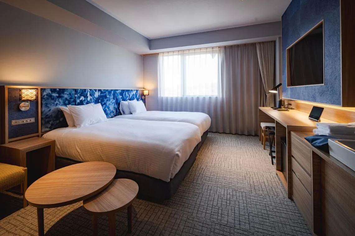 Photo of the whole room, Bed in UNO HOTEL