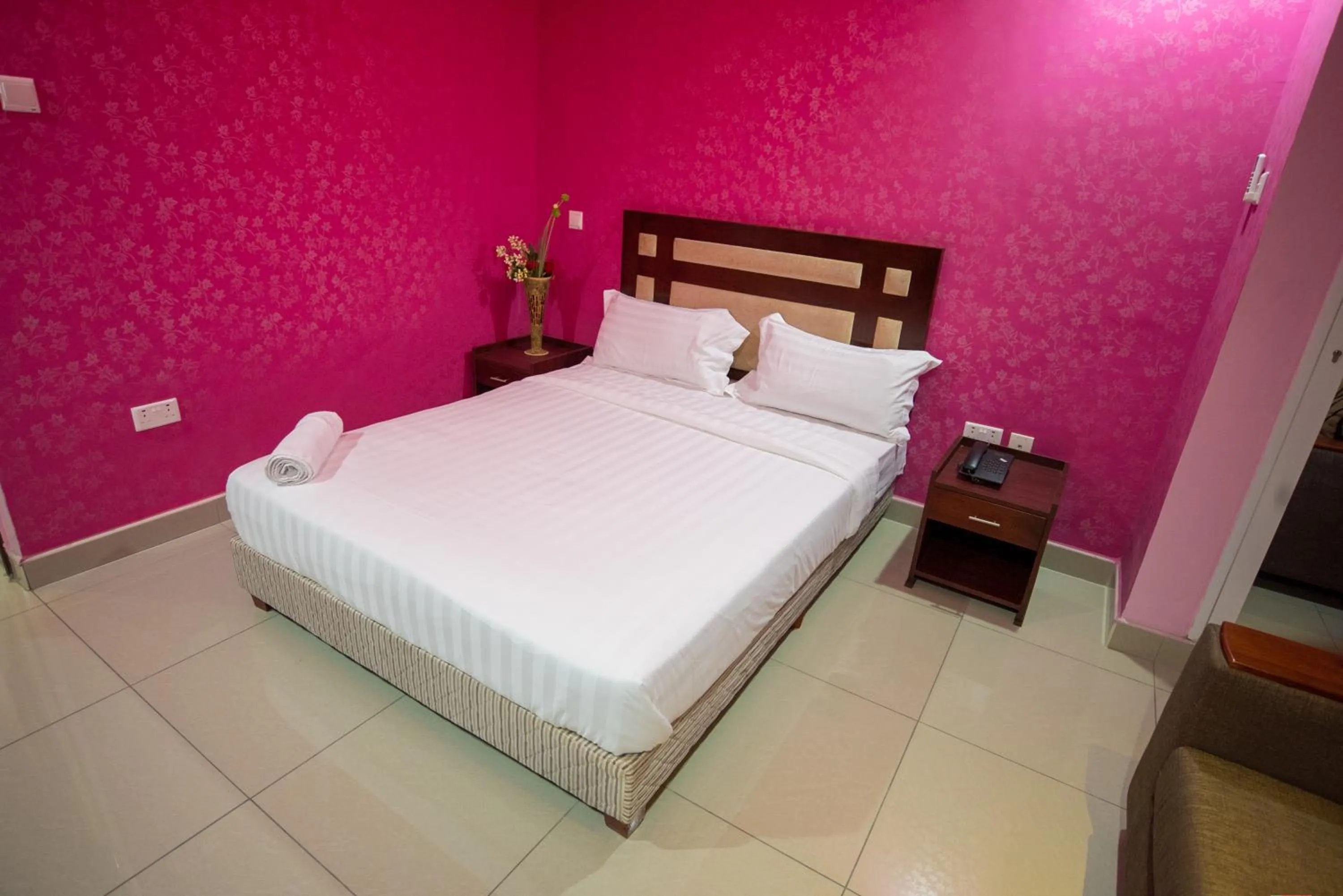 Bed in Euro Hotel and Apartments