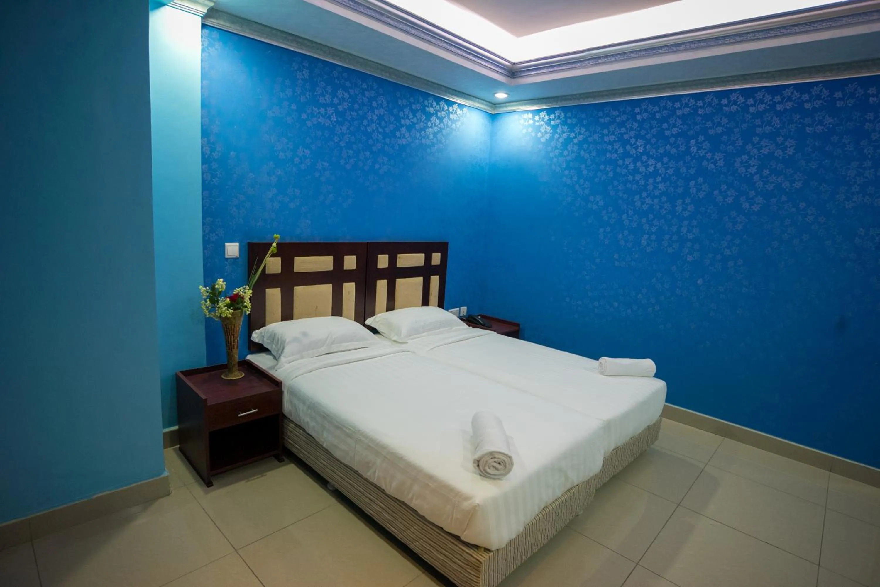 Bed in Euro Hotel and Apartments