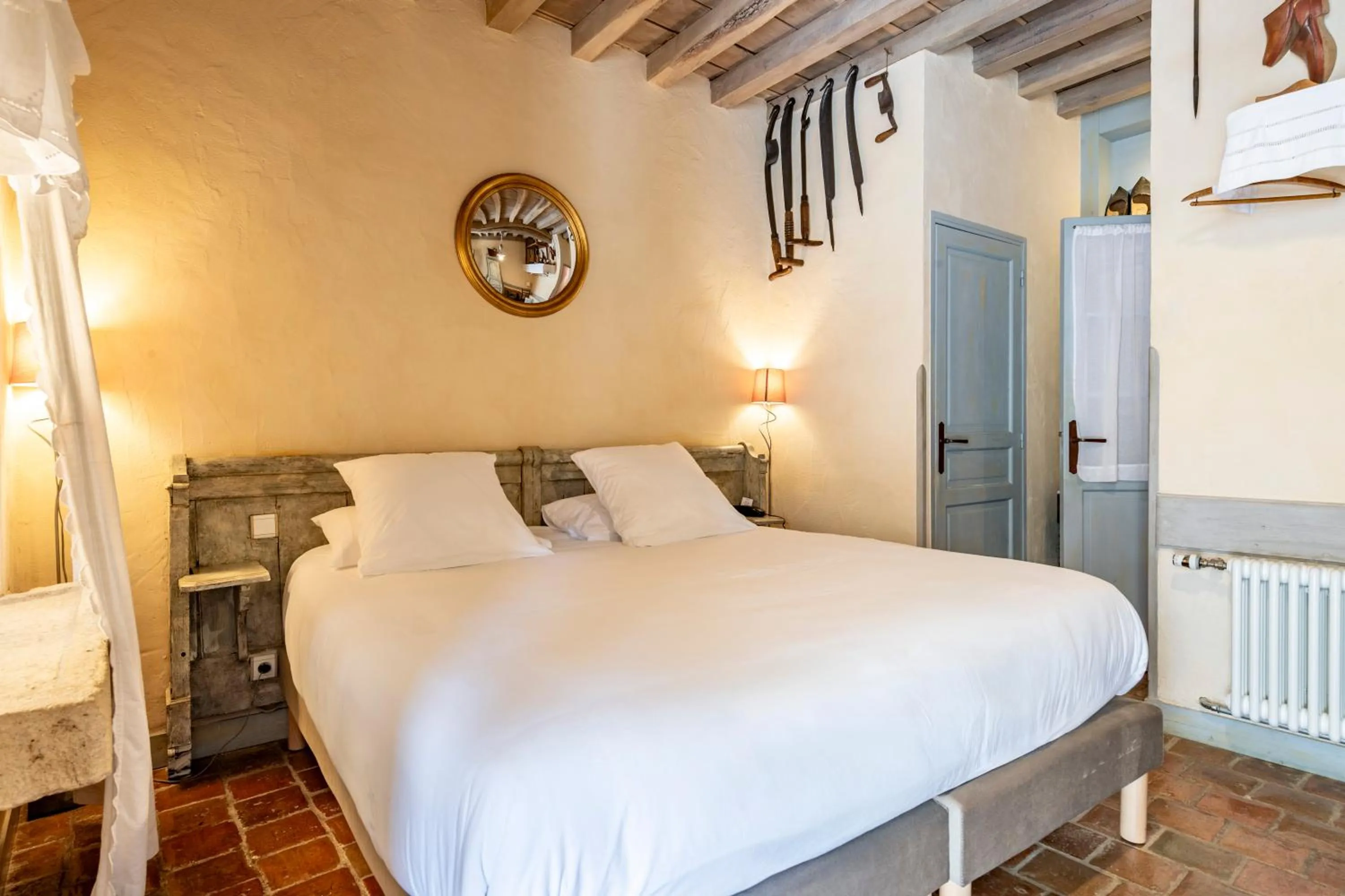 Bed in Hôtel De La Beursaudiere