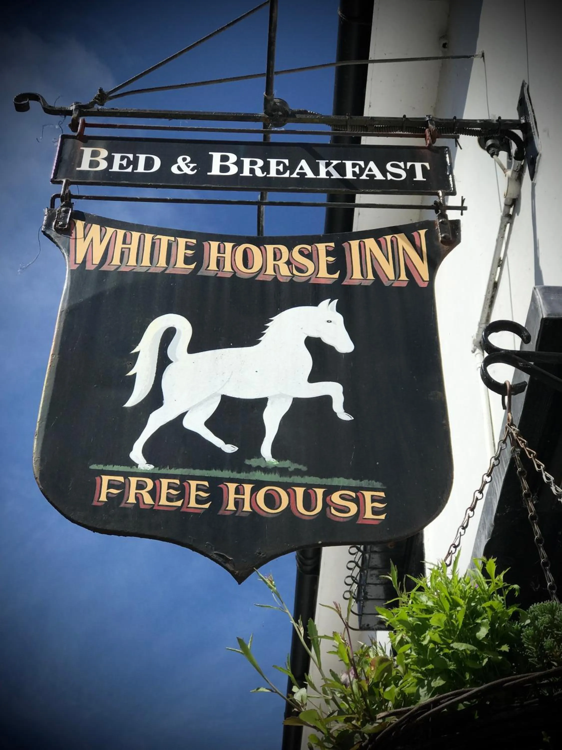 Property logo or sign in The White Horse Inn, Clun