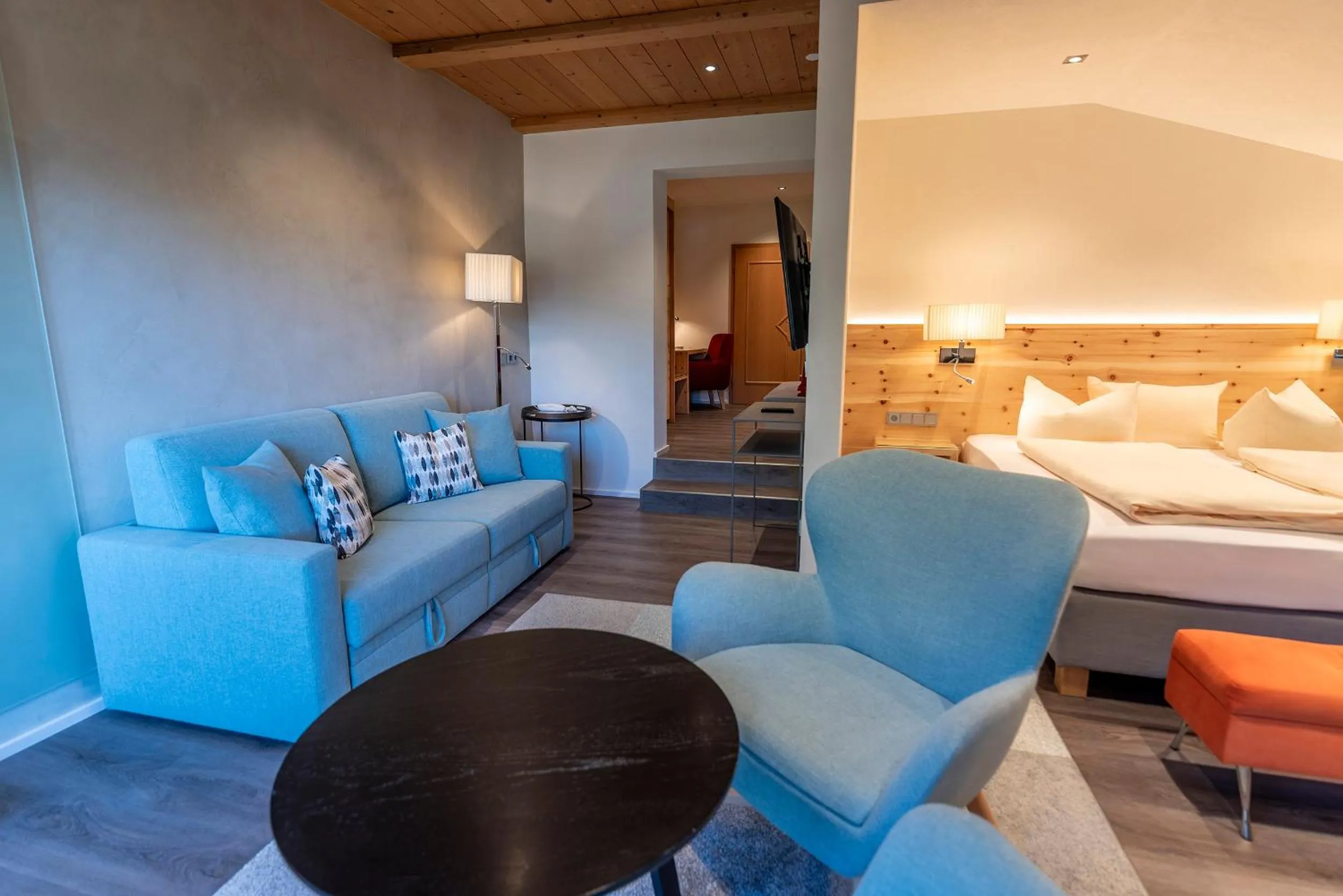 Seating area, Bed in ARNIKA Garni