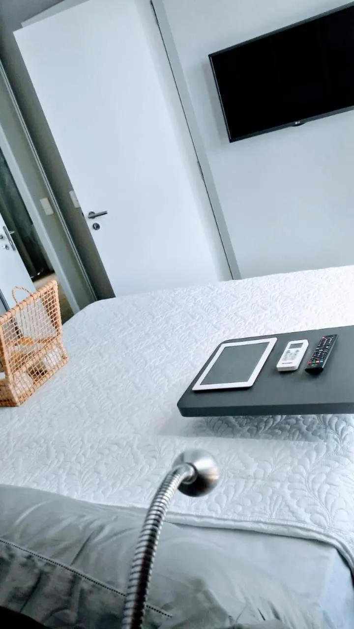 Bed in Salvador Mondial Flats