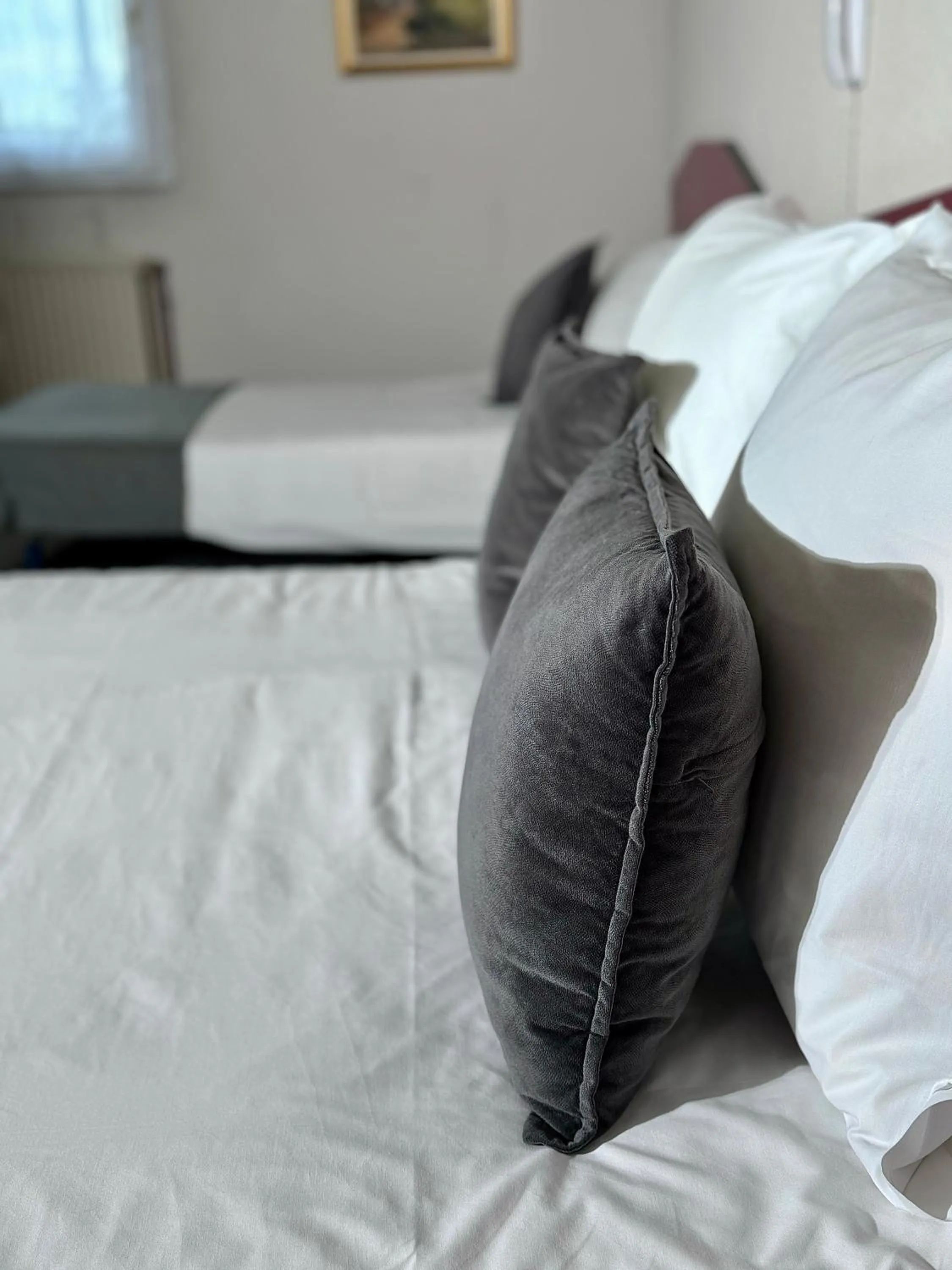 Bed in HOTEL De La Tour Saint Etienne SUD