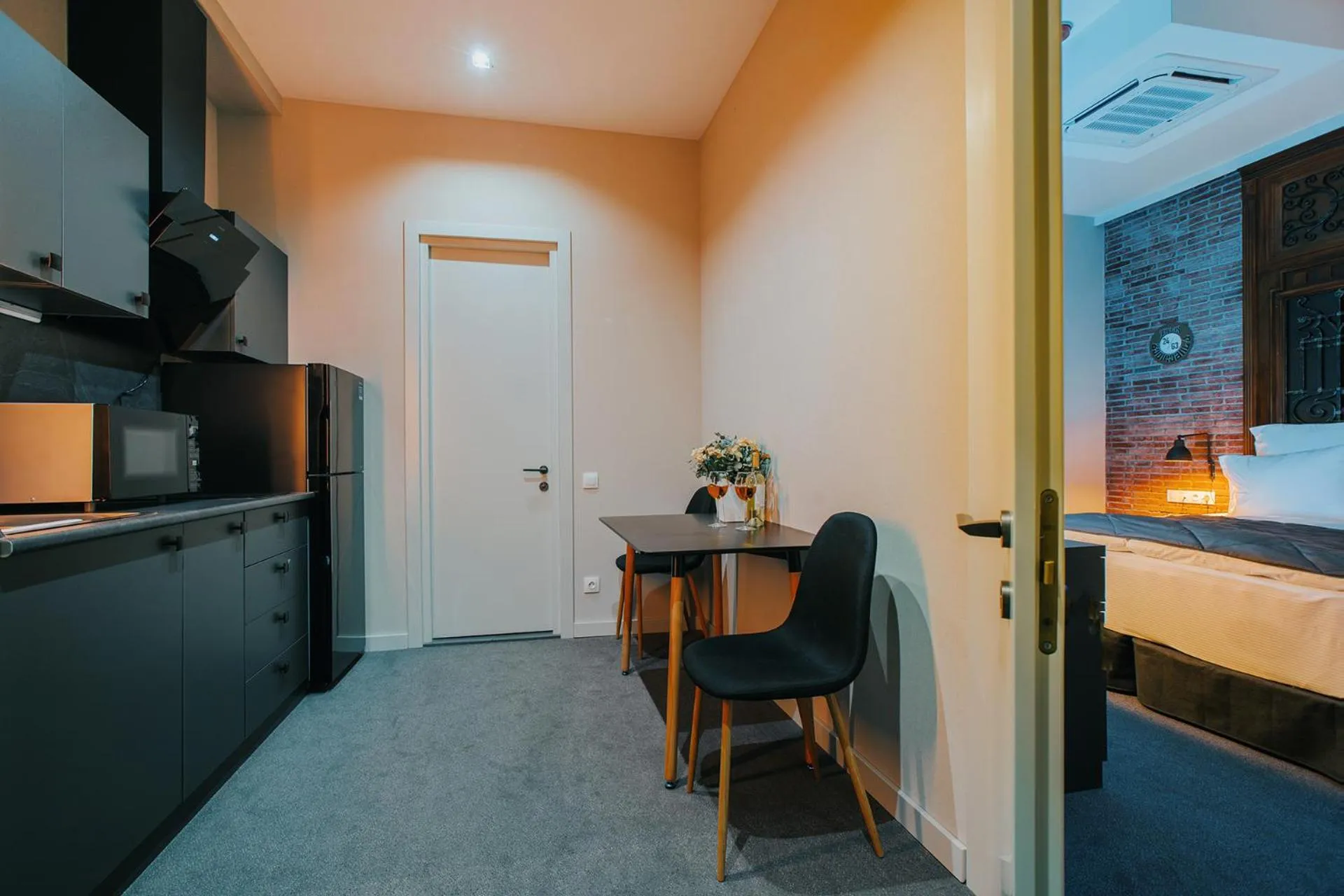 Kitchen or kitchenette, Bed in TbiliSee Hotel