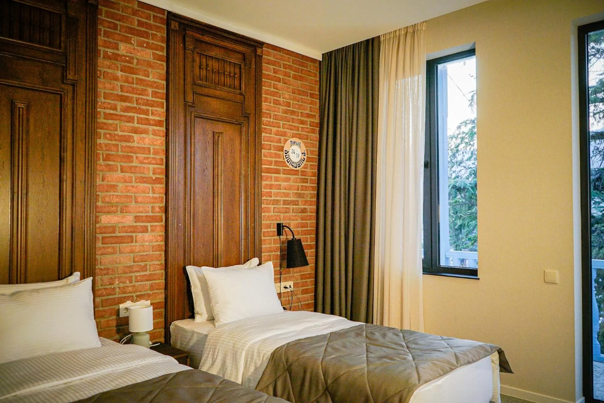 Bed in TbiliSee Hotel