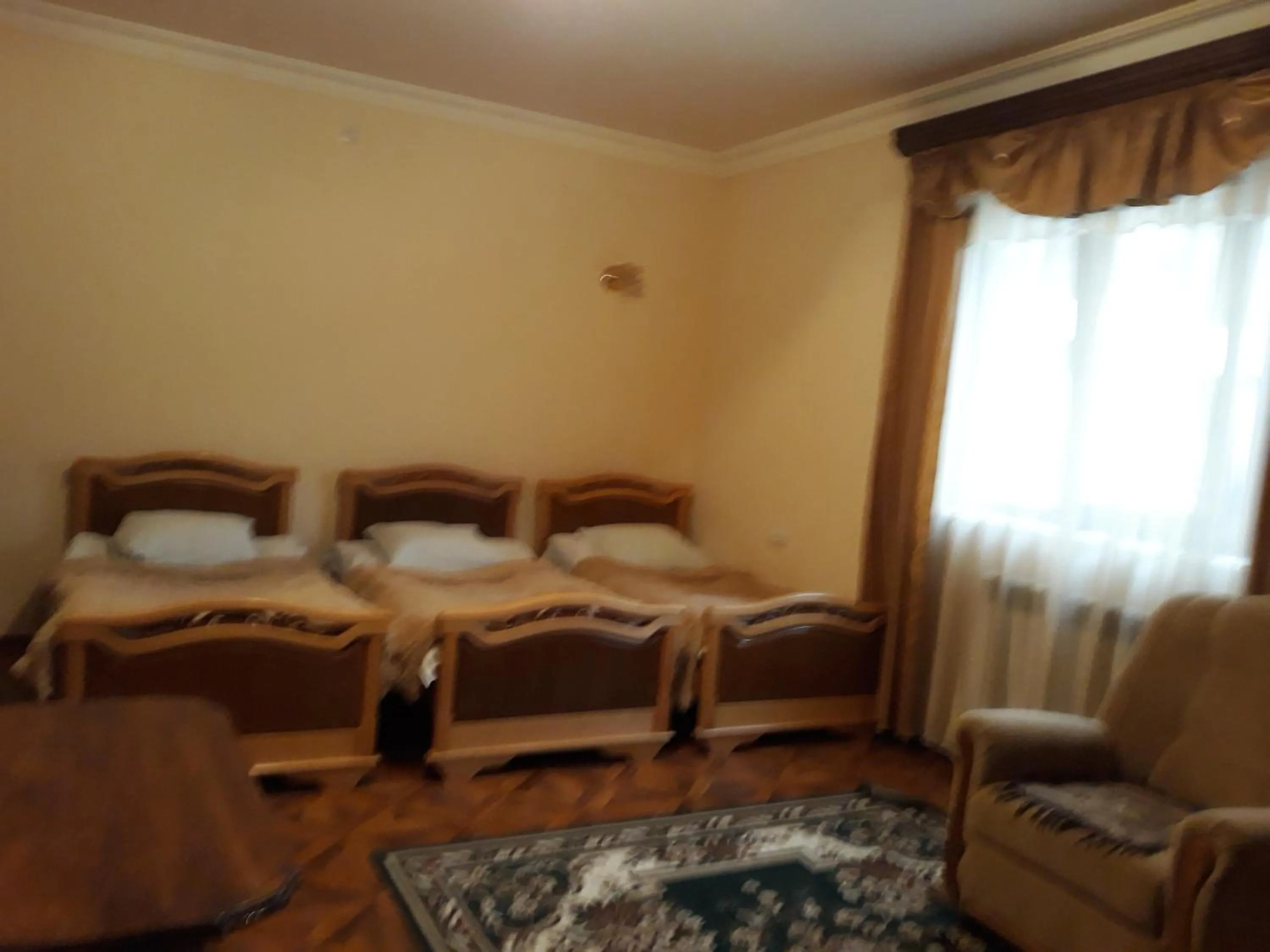 Living room, Bed in Hotel Noy
