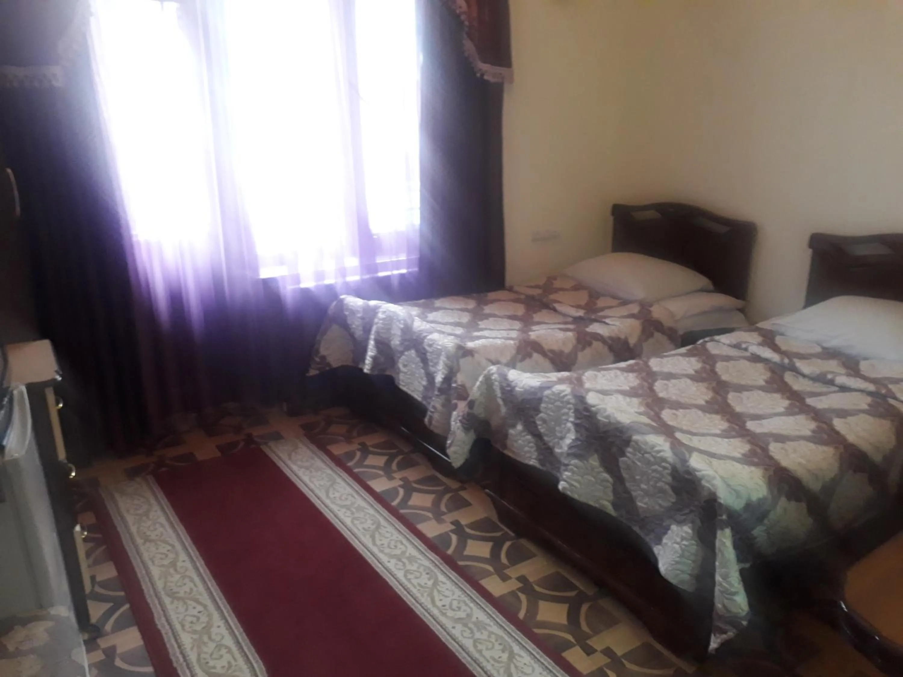 Toilet, Bed in Hotel Noy
