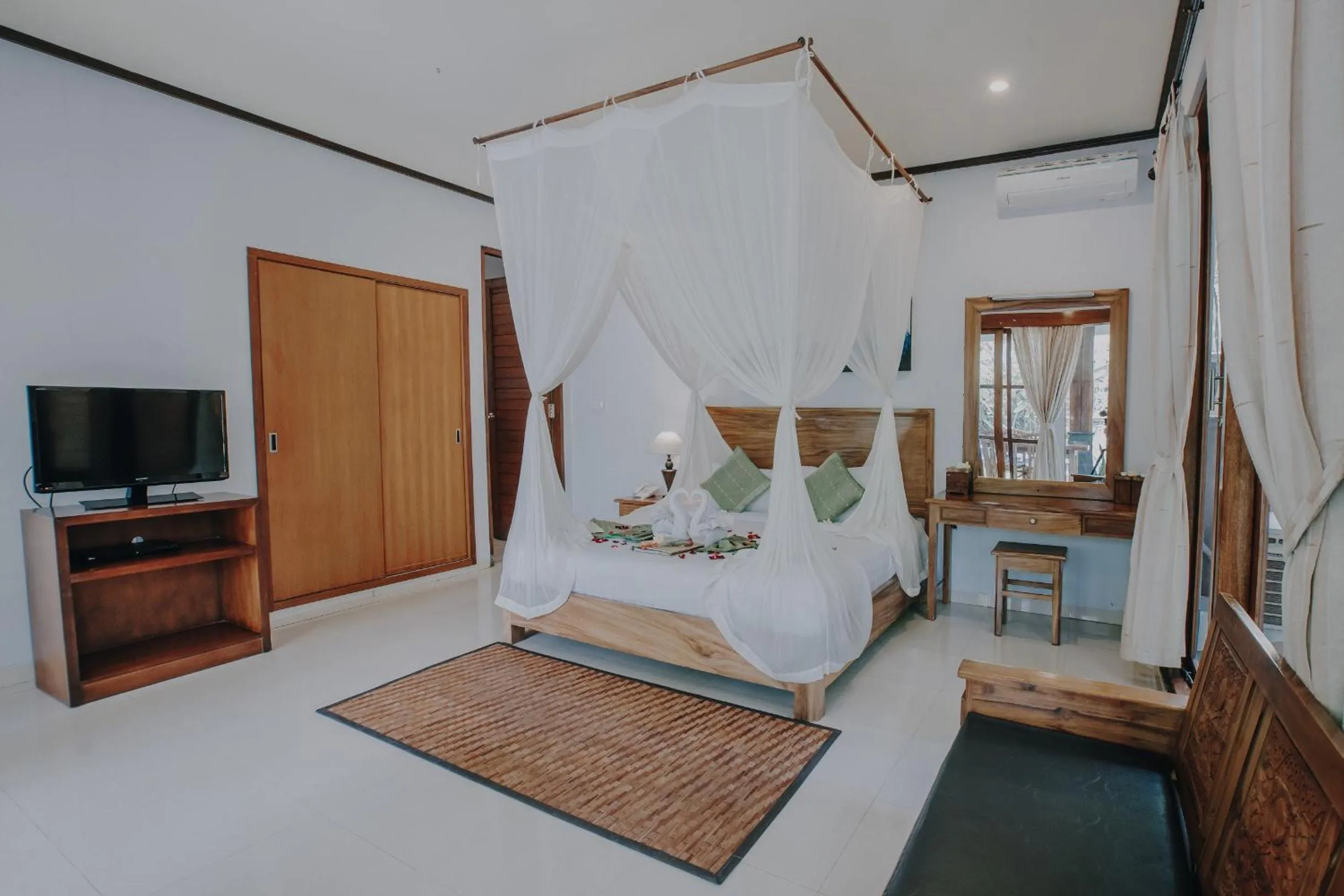 Photo of the whole room, Bed in Budhi Ayu Villas and Cottages Ubud by Mahaputra-CHSE Certified