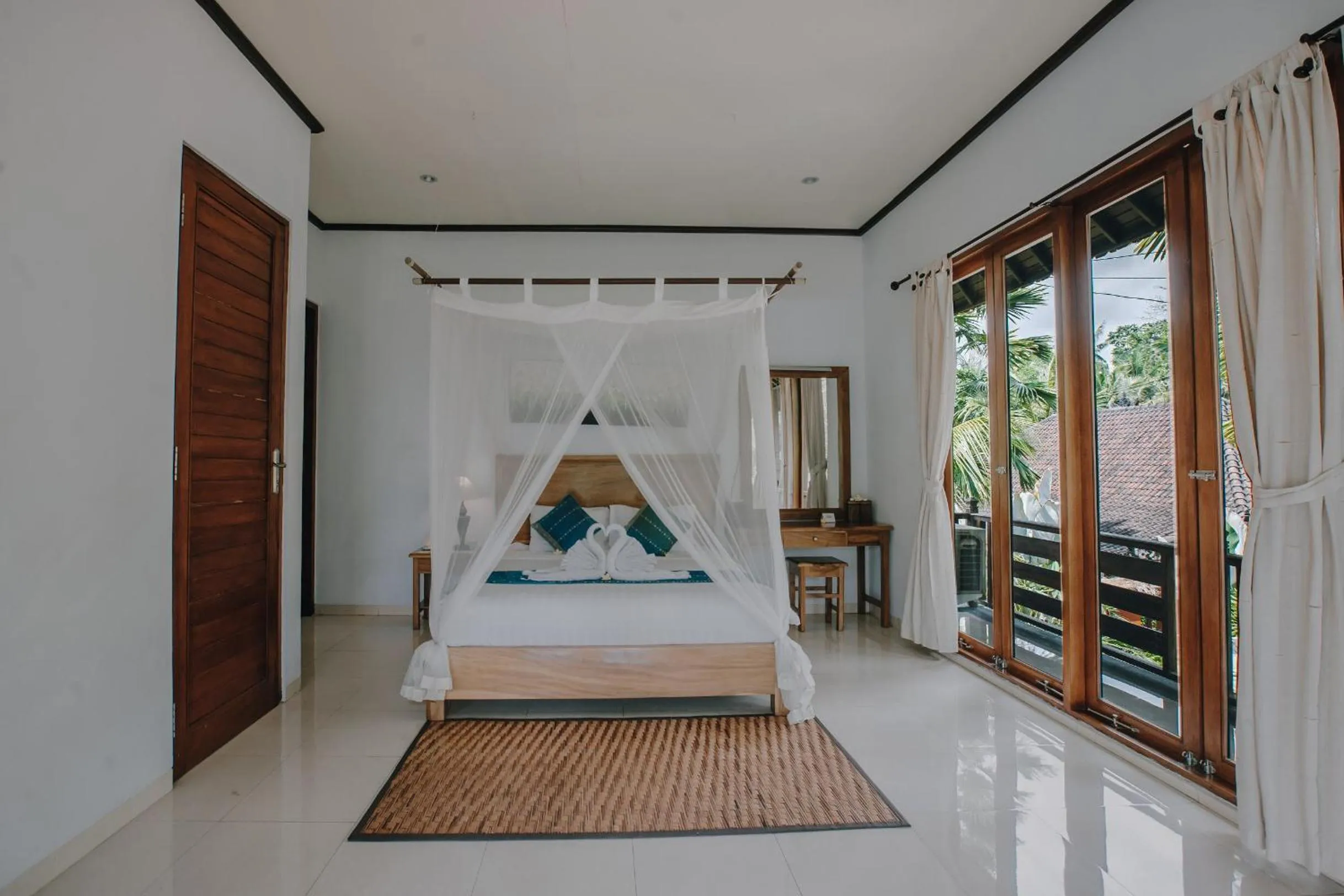 Photo of the whole room, Bed in Budhi Ayu Villas and Cottages Ubud by Mahaputra-CHSE Certified