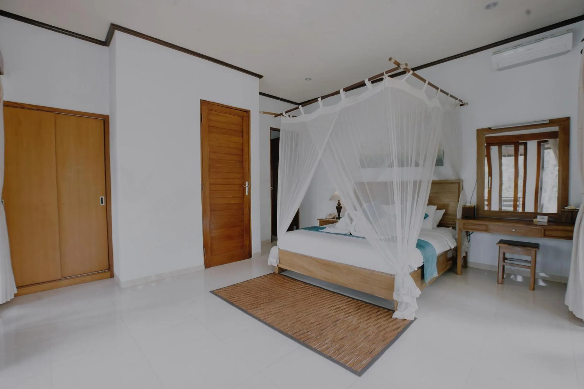 Photo of the whole room, Bed in Budhi Ayu Villas and Cottages Ubud by Mahaputra-CHSE Certified
