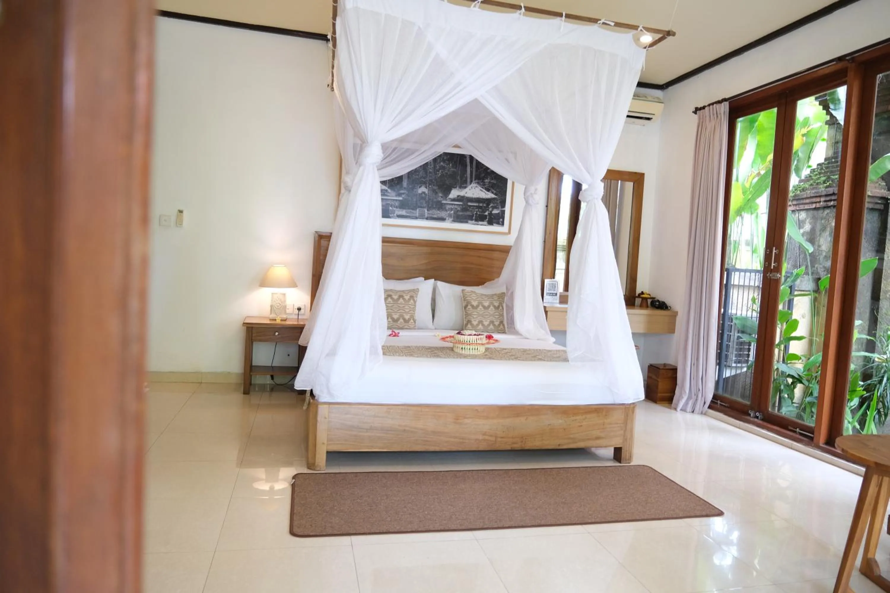 Bed in Budhi Ayu Villas and Cottages Ubud by Mahaputra-CHSE Certified