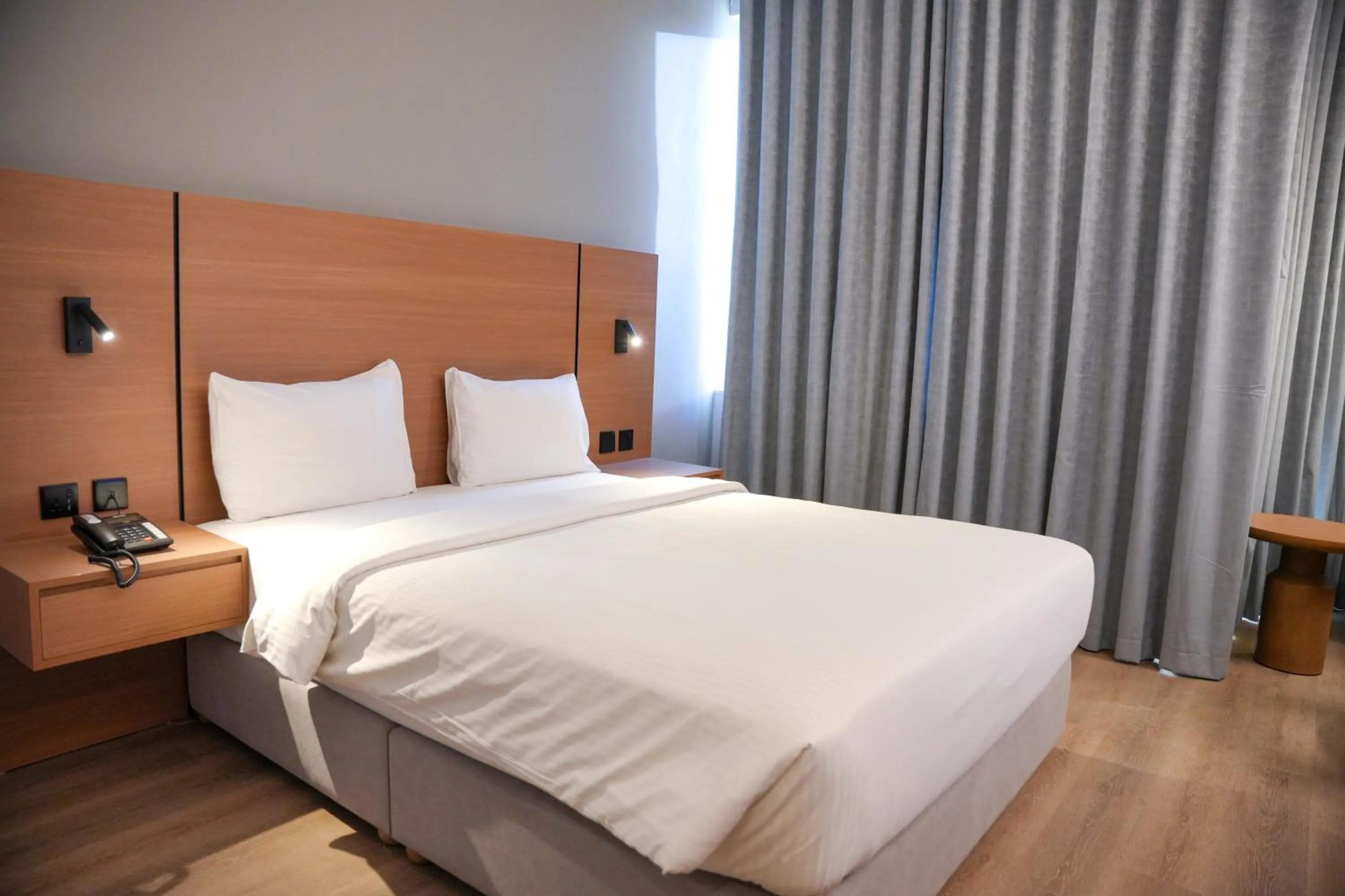 Bedroom, Bed in Grand Continental Hotel