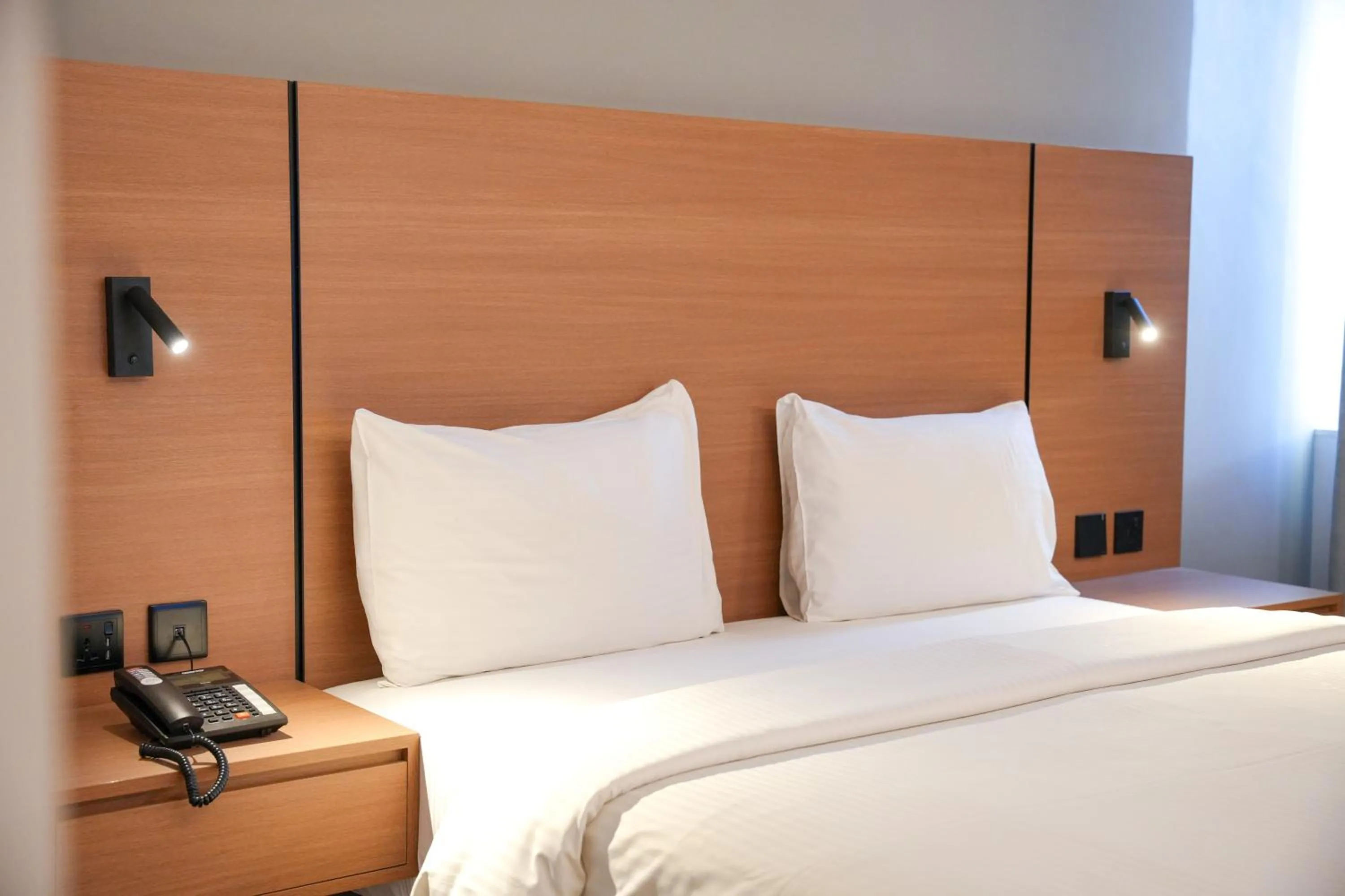 Bedroom, Bed in Grand Continental Hotel