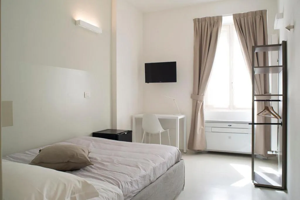 Bed in L'Ottava GuestHouse