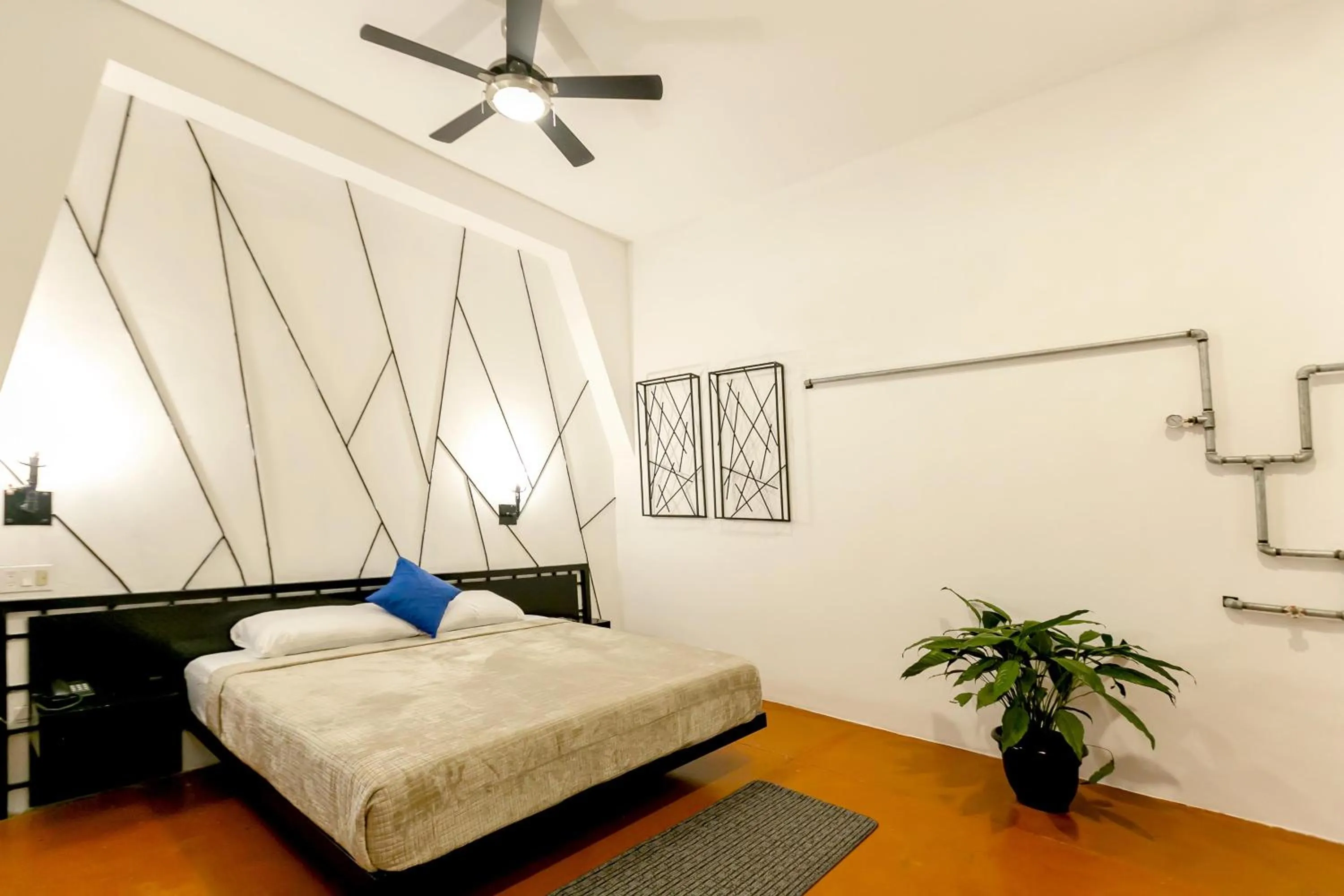 Bed in D' LA TORRE HOTEL