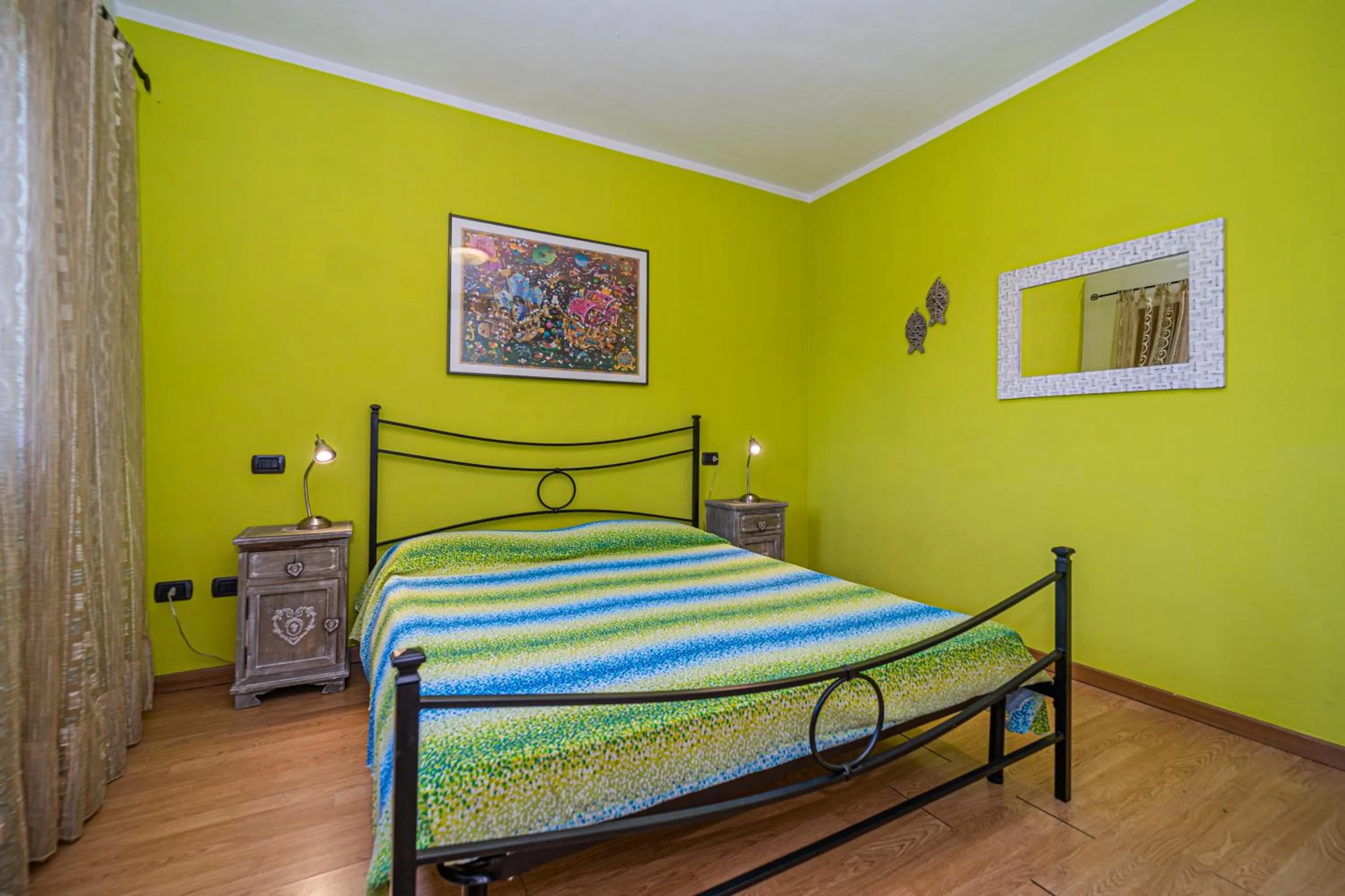 Bed in Master apartment in villa 6 to 8 persons with large private garden